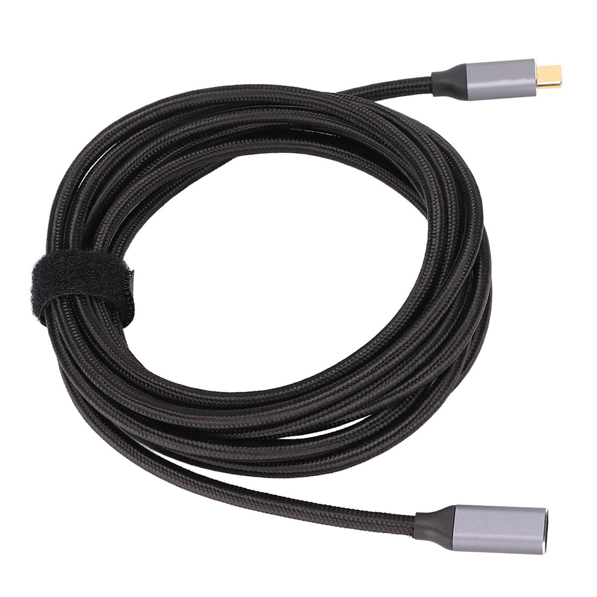 Ein schwarzes Kabel mit grauen Enden. Es ist aufgerollt und mit einem Klettverschluss befestigt.