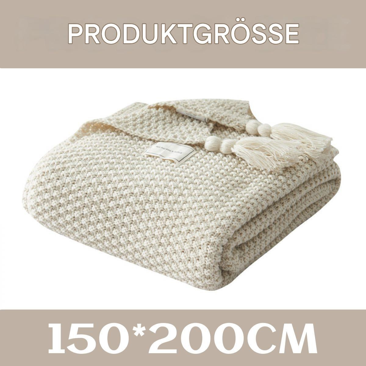 Beige Strickdecke mit Quasten, beschriftet mit Produktgröße: 150*200cm. Die Decke ist gefaltet.
