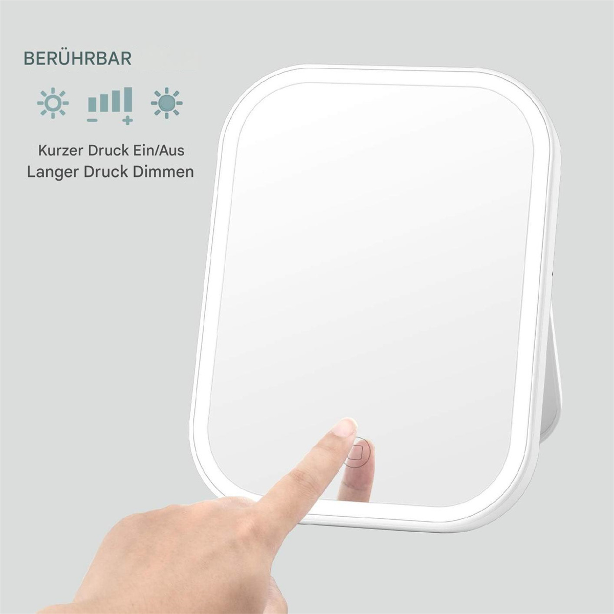 Weißer, beleuchteter Schminkspiegel. Ein Finger berührt die Touch-Steuerung.