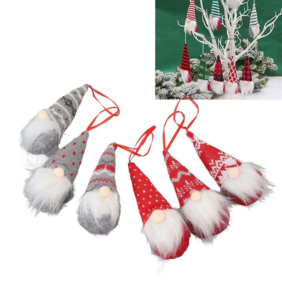 Mehrere Weihnachtszwerg-Ornamente mit langen Hüten und Bärten, einige hängen an einem weißen Baum.