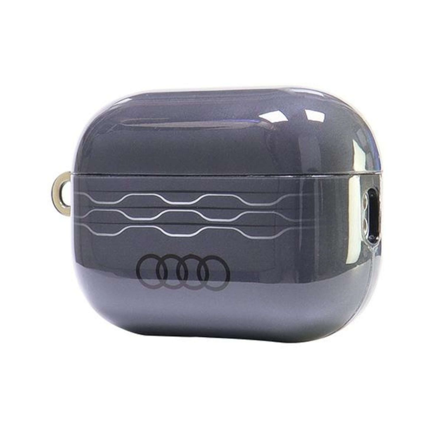 Una custodia grigia per auricolari con il logo Audi, su una superficie bianca, che mostra il design e la forma del marchio.