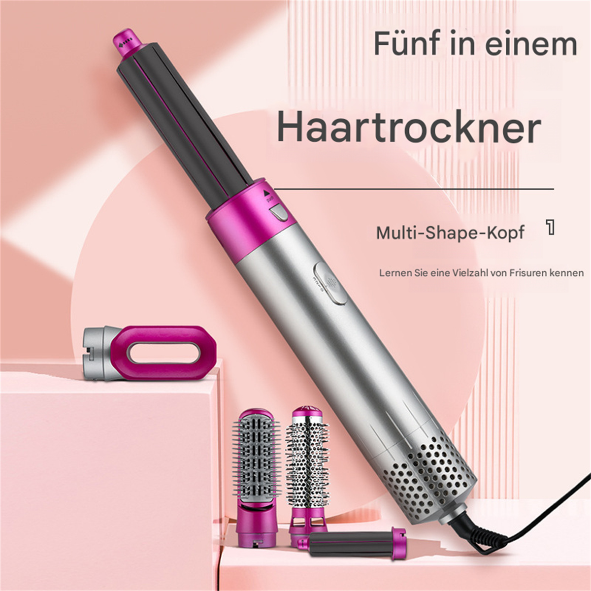 Ein Haarstyling-Werkzeug mit mehreren austauschbaren Köpfen und rosa Hintergrund.