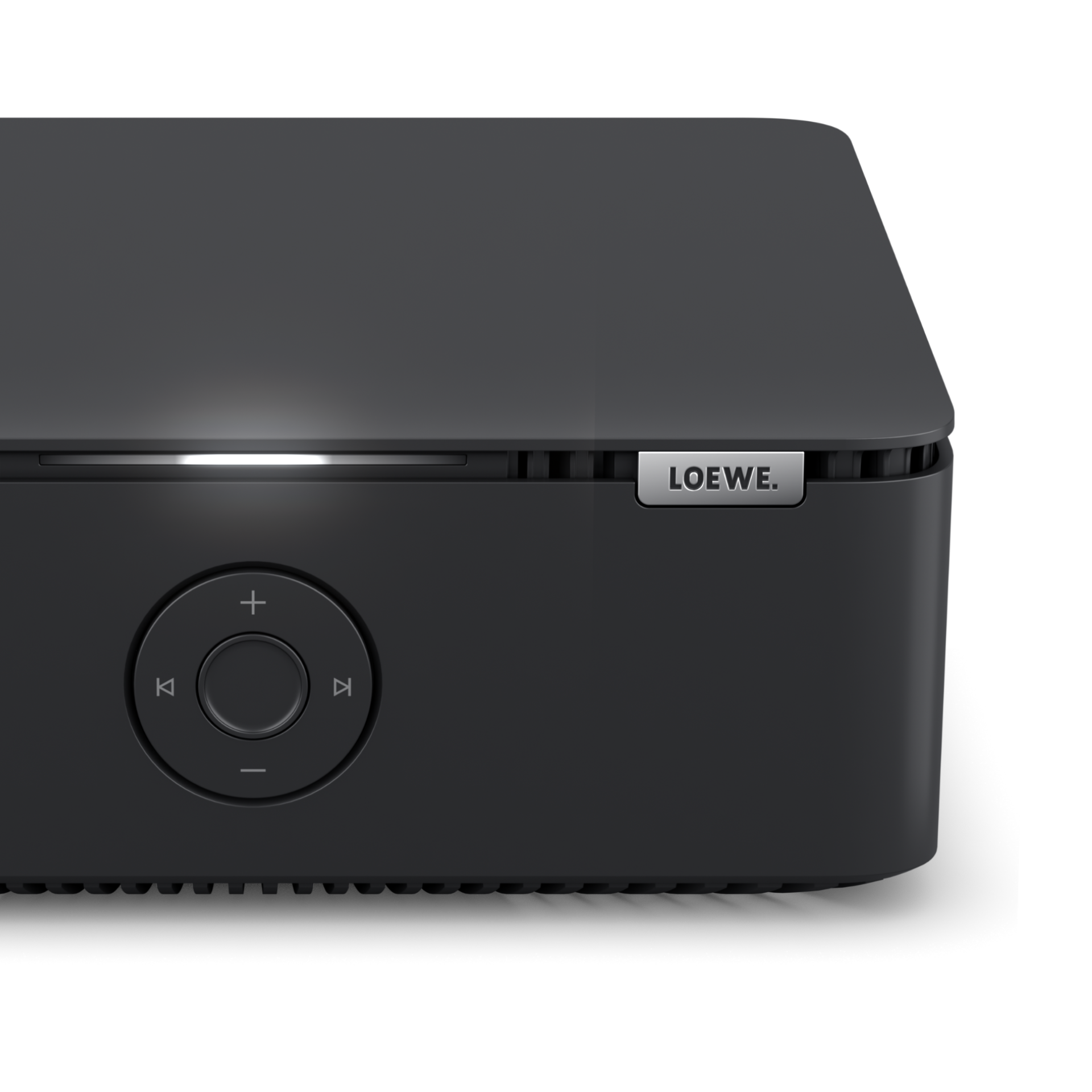 Un dispositivo Loewe grigio scuro. Ha pulsanti di controllo e un logo Loewe sul lato.