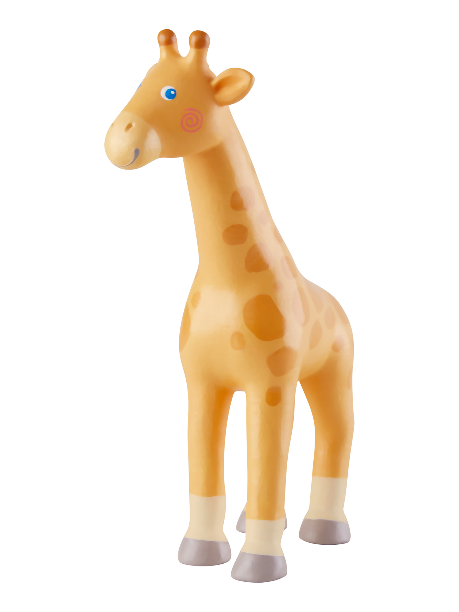 Ein gelbes Giraffenspielzeug mit braunen Flecken, das auf einer weißen Oberfläche steht.