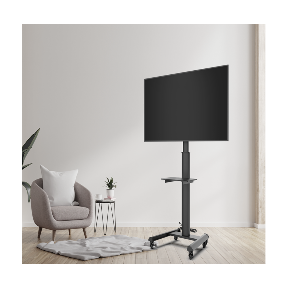 Een moderne woonkamer met een tv op een standaard, een stoel, een bijzettafel en een vloerkleed.