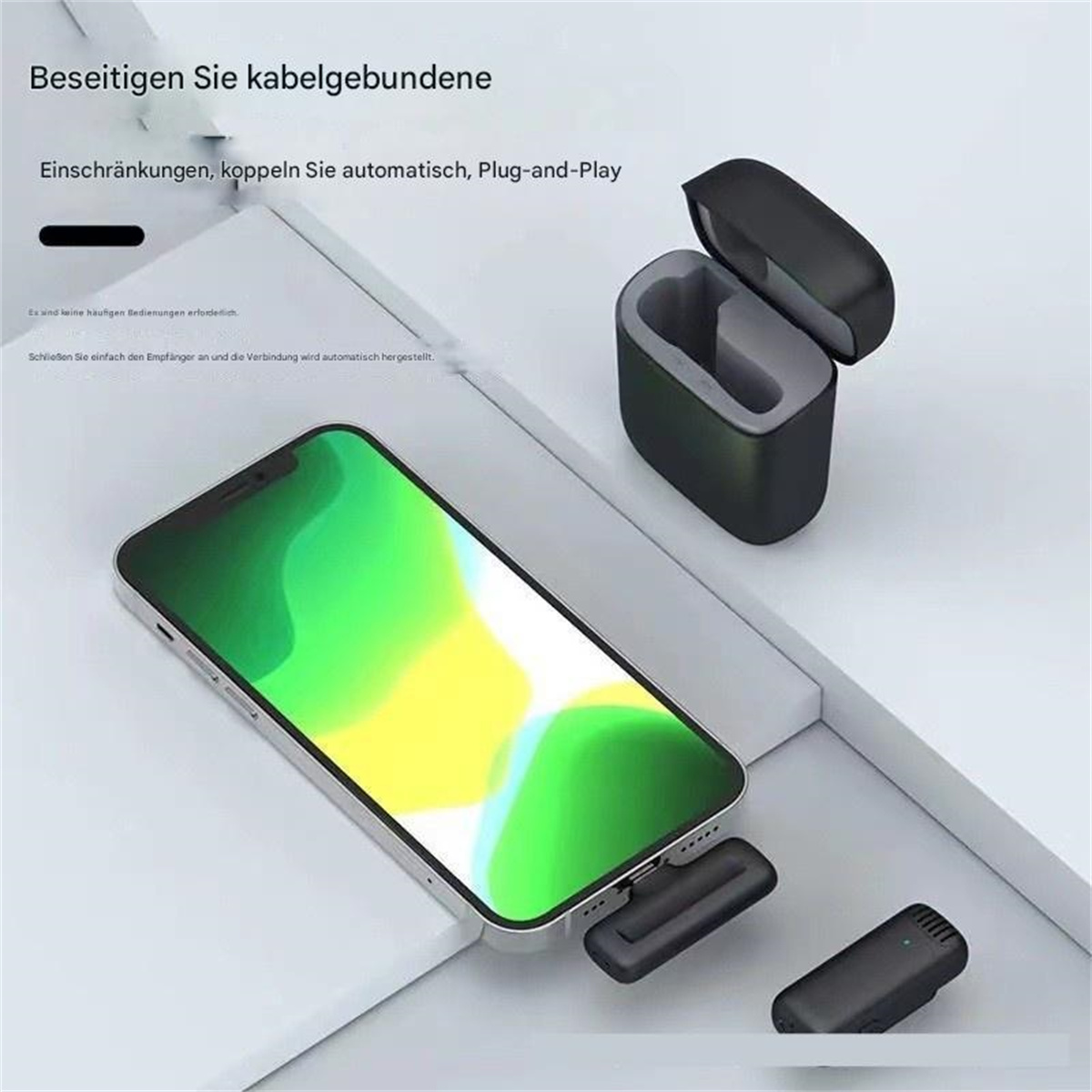 Ein Smartphone mit Empfänger und Ladestation. Das Setup ermöglicht drahtloses Audio.