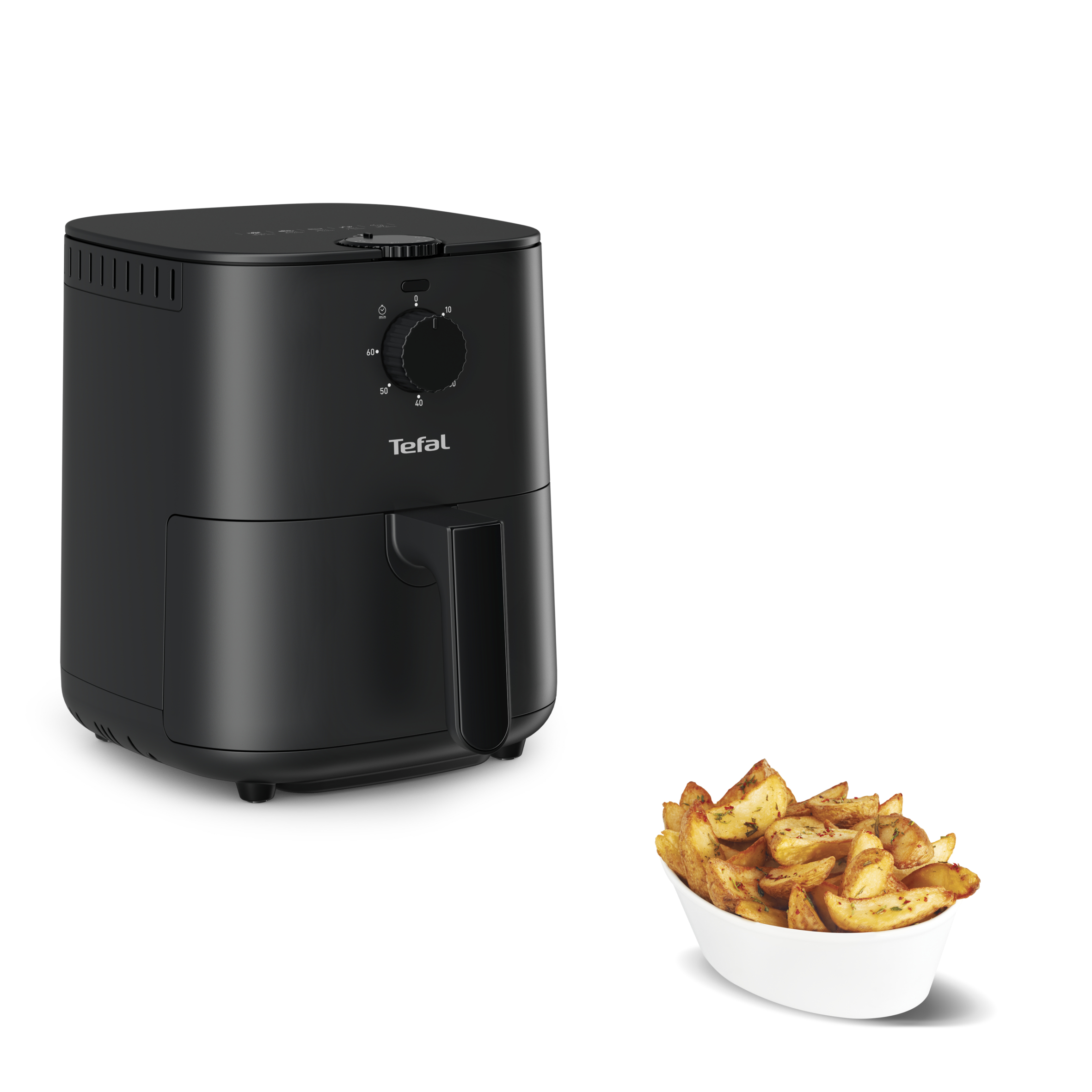 Friggitrice ad aria nera con una ciotola di spicchi di patate fritte accanto.