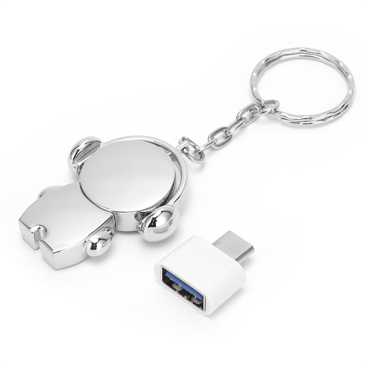 Silberner Schlüsselanhänger mit USB-C-Adapter und USB-Anschluss.