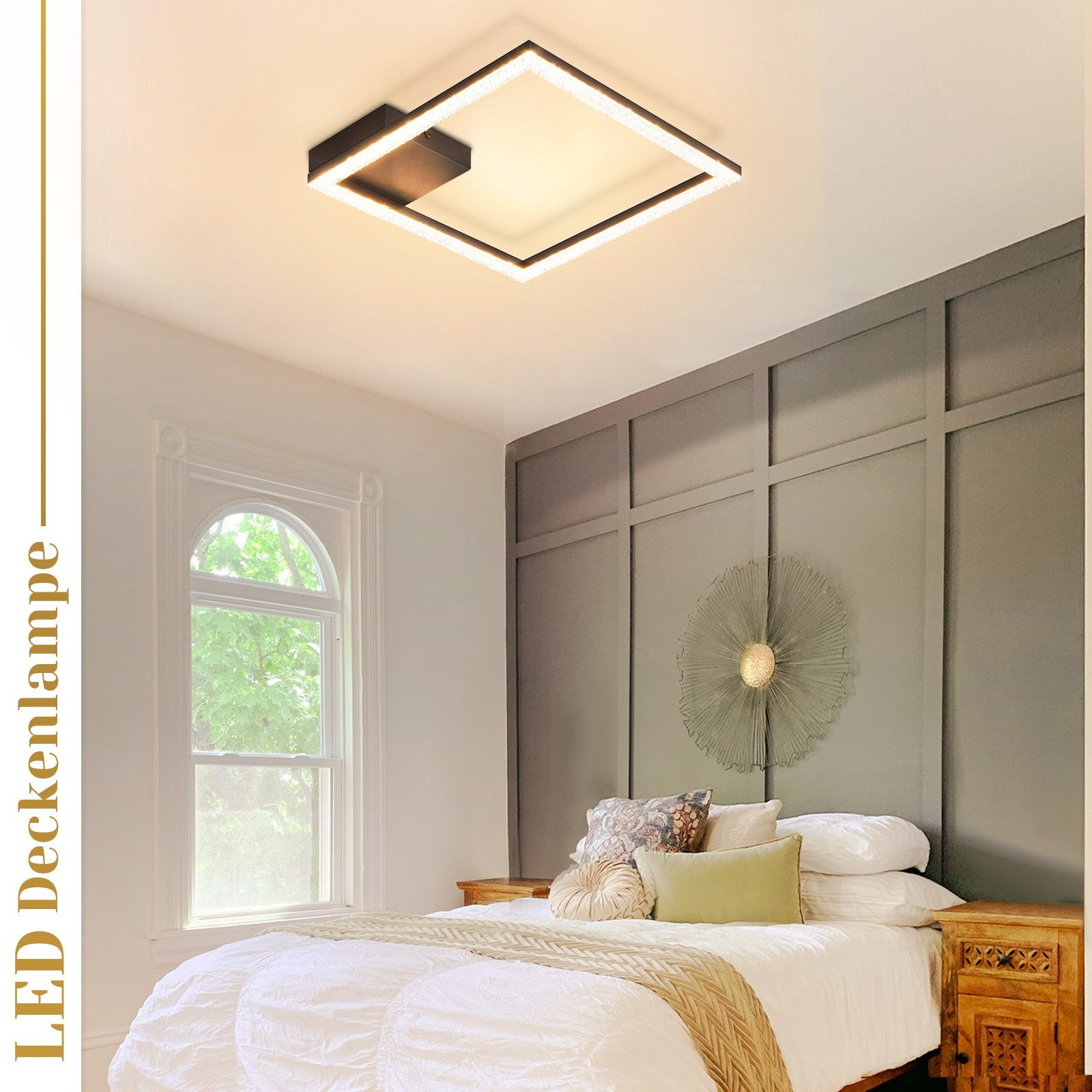 Una lampada da soffitto a LED quadrata è sopra un letto. Un muro è dietro il letto.