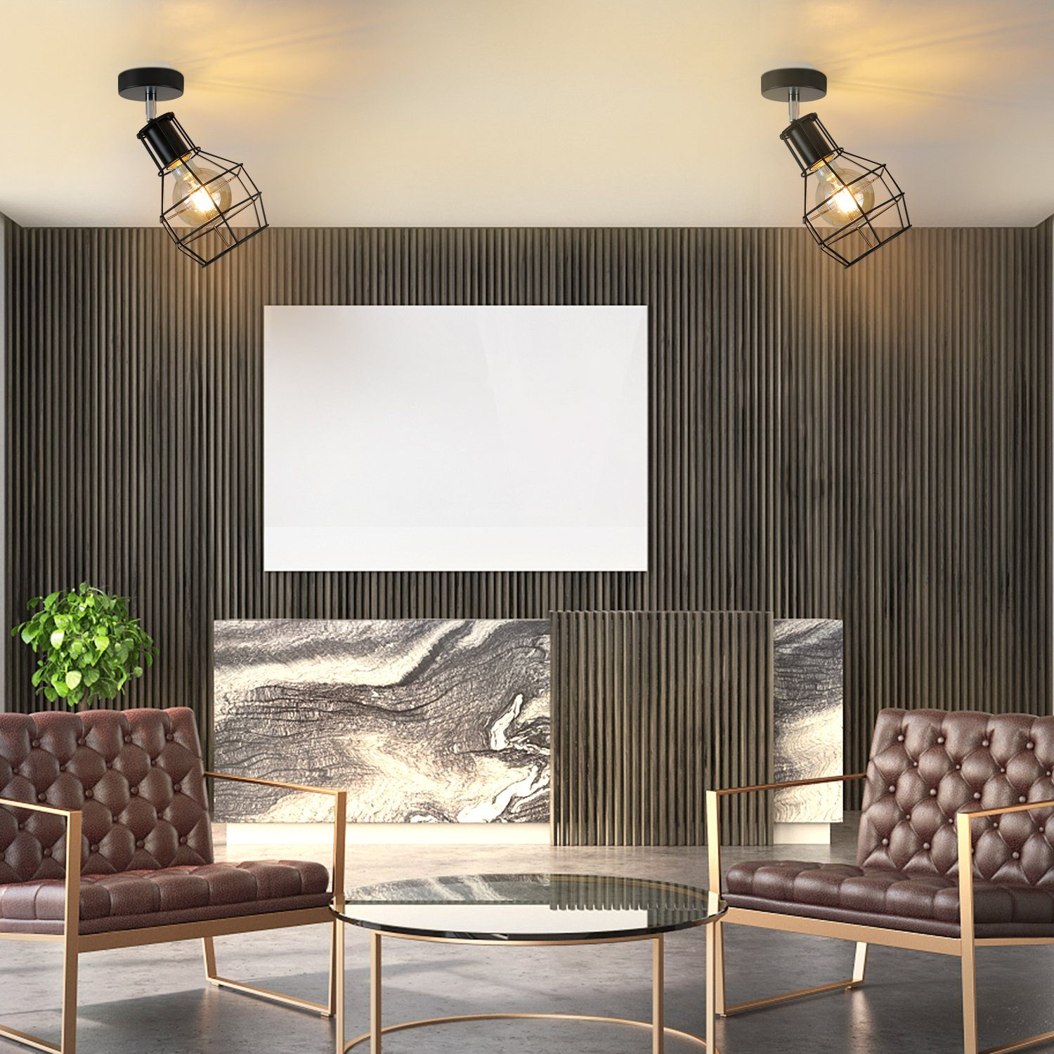 Scena wnętrza z dwoma brązowymi skórzanymi krzesłami, szklanym stołem i dwoma reflektorami szynowymi. Drewniana ściana panelowa.