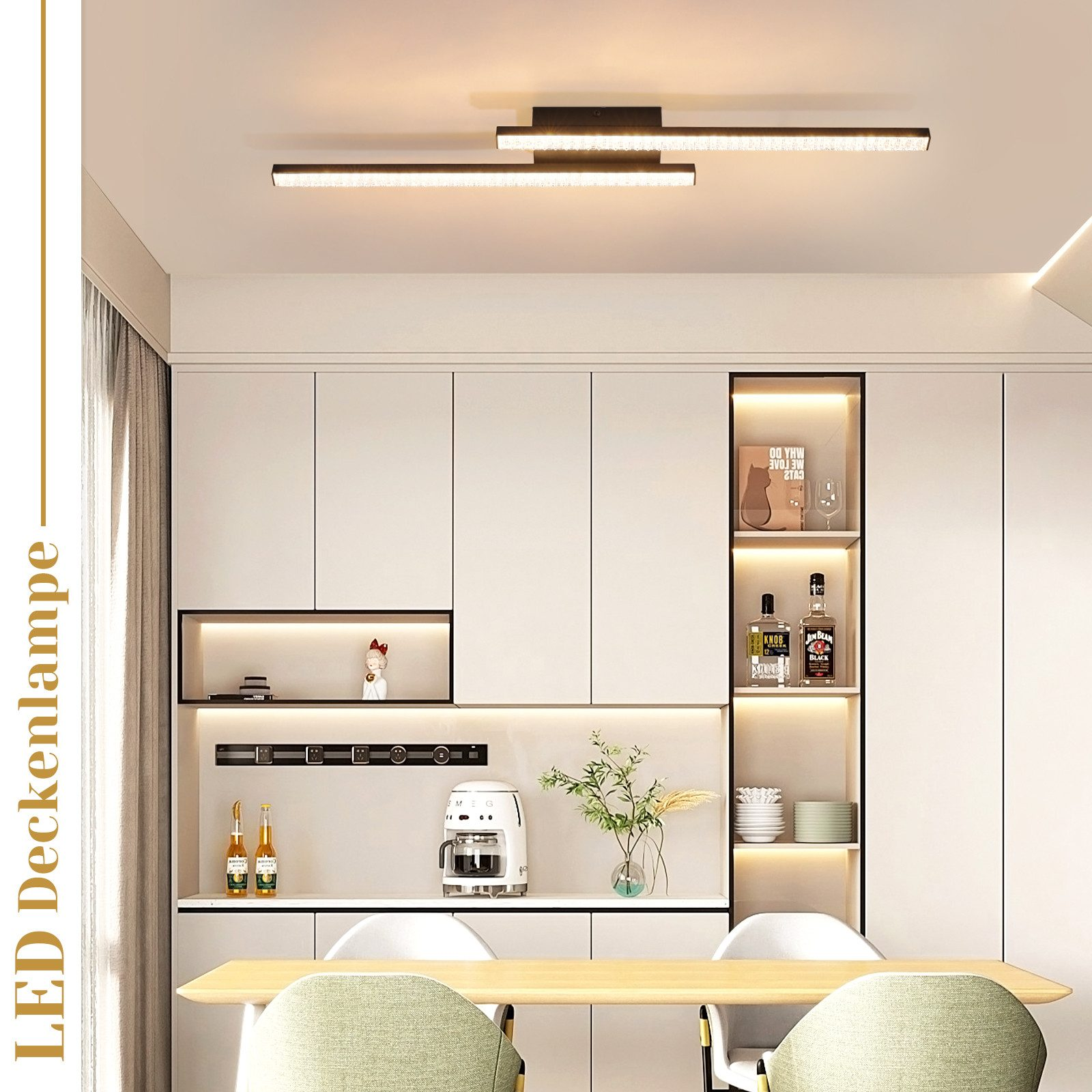 Cocina moderna con una lámpara de techo LED larga. Armarios y electrodomésticos en el fondo.