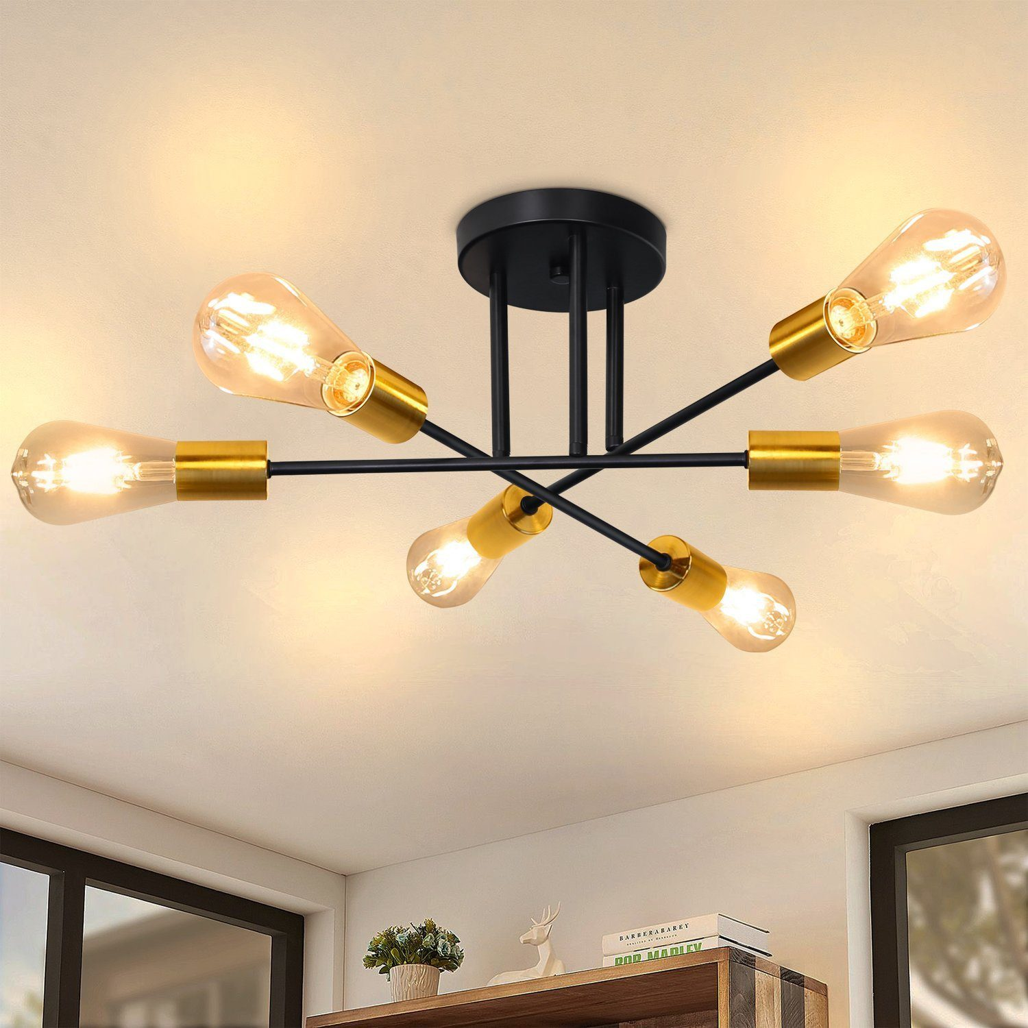 Nowoczesna lampa sufitowa z sześcioma odsłoniętymi żarówkami w stylu Edisona.