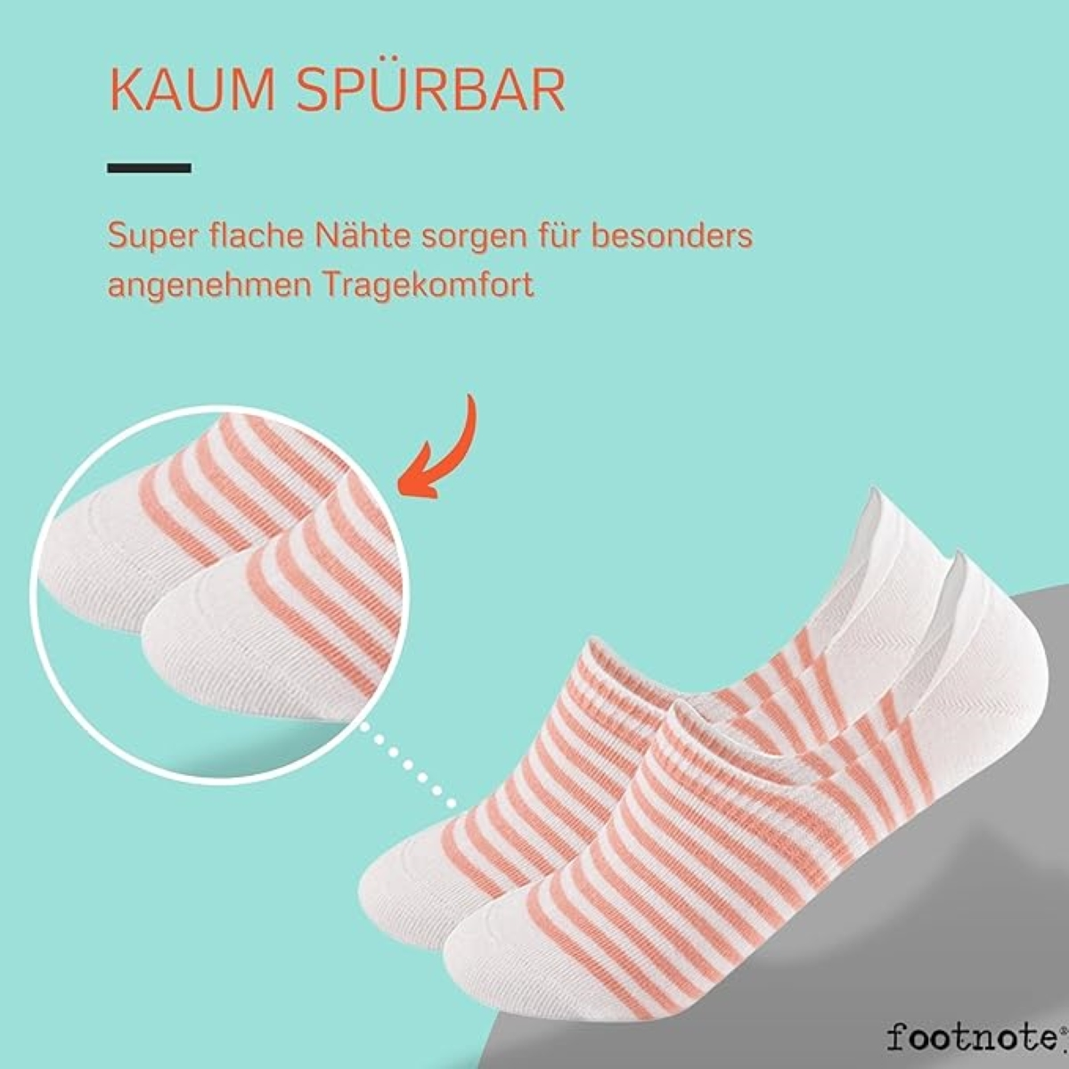 Weiße Socken mit rosa Streifen. Nahaufnahme mit Text auf Deutsch.
