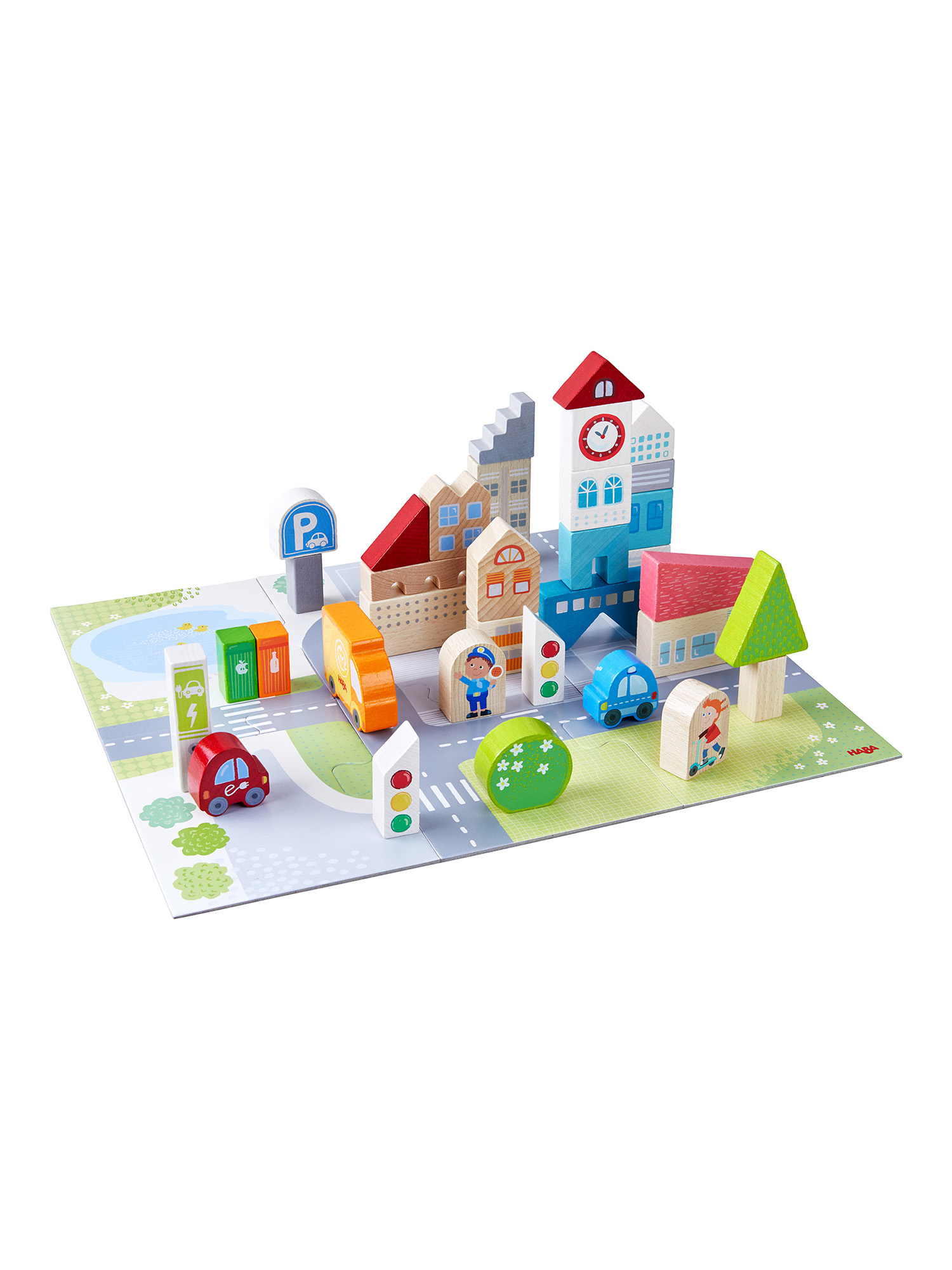 Buntes Holzspielzeug-Stadtset mit Gebäuden, Fahrzeugen, Bäumen und Straßenschildern auf einer Spielmatte.