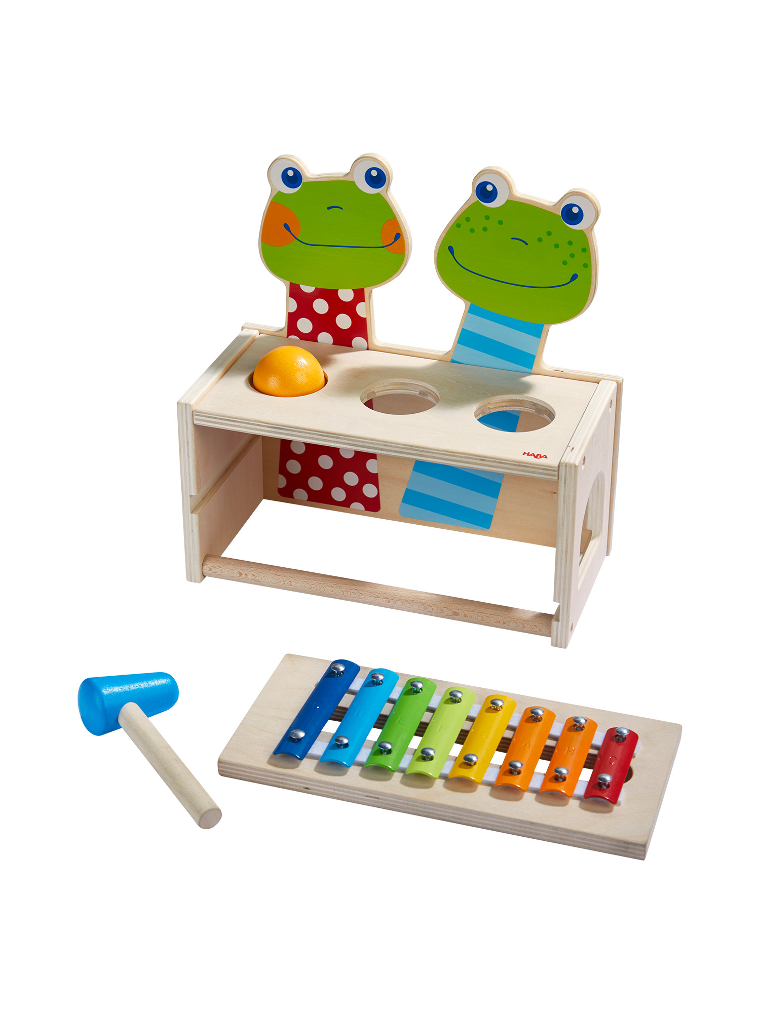 Holzspielzeug mit zwei Froschgesichtern, einem Xylophon und einem Schlägel. Beinhaltet einen Ball und eine Holzkiste.