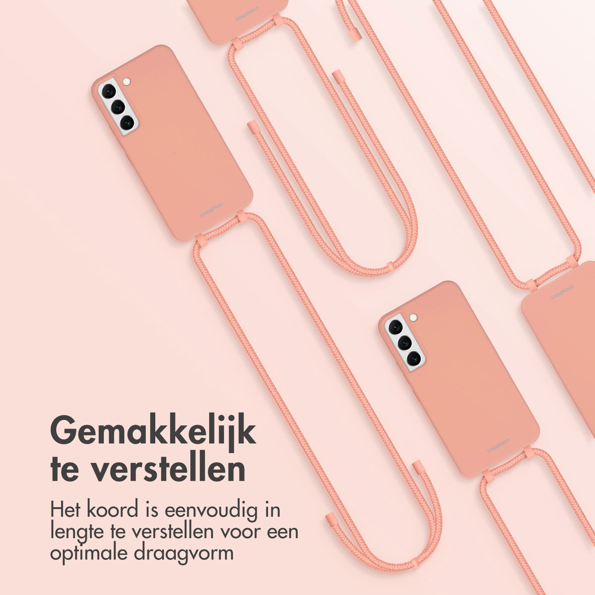 Roze telefoonhoesjes met roze koorden. Meerdere hoesjes op roze gerangschikt.