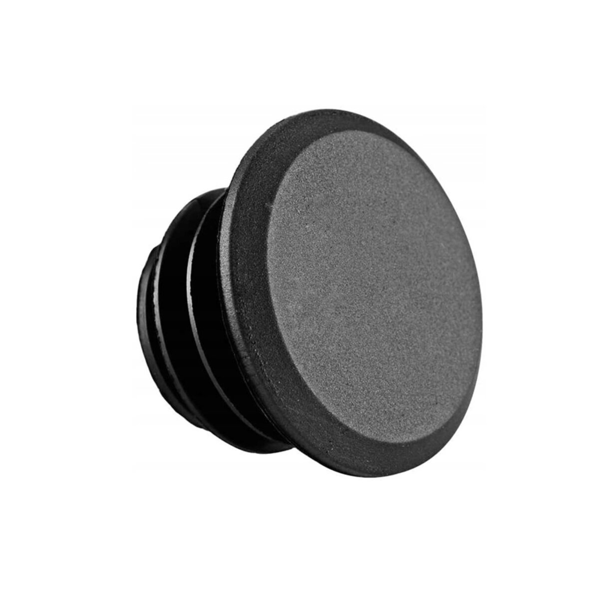 Czarna, okrągła wtyczka z rowkowaną stroną, widziana pod kątem na białym tle.