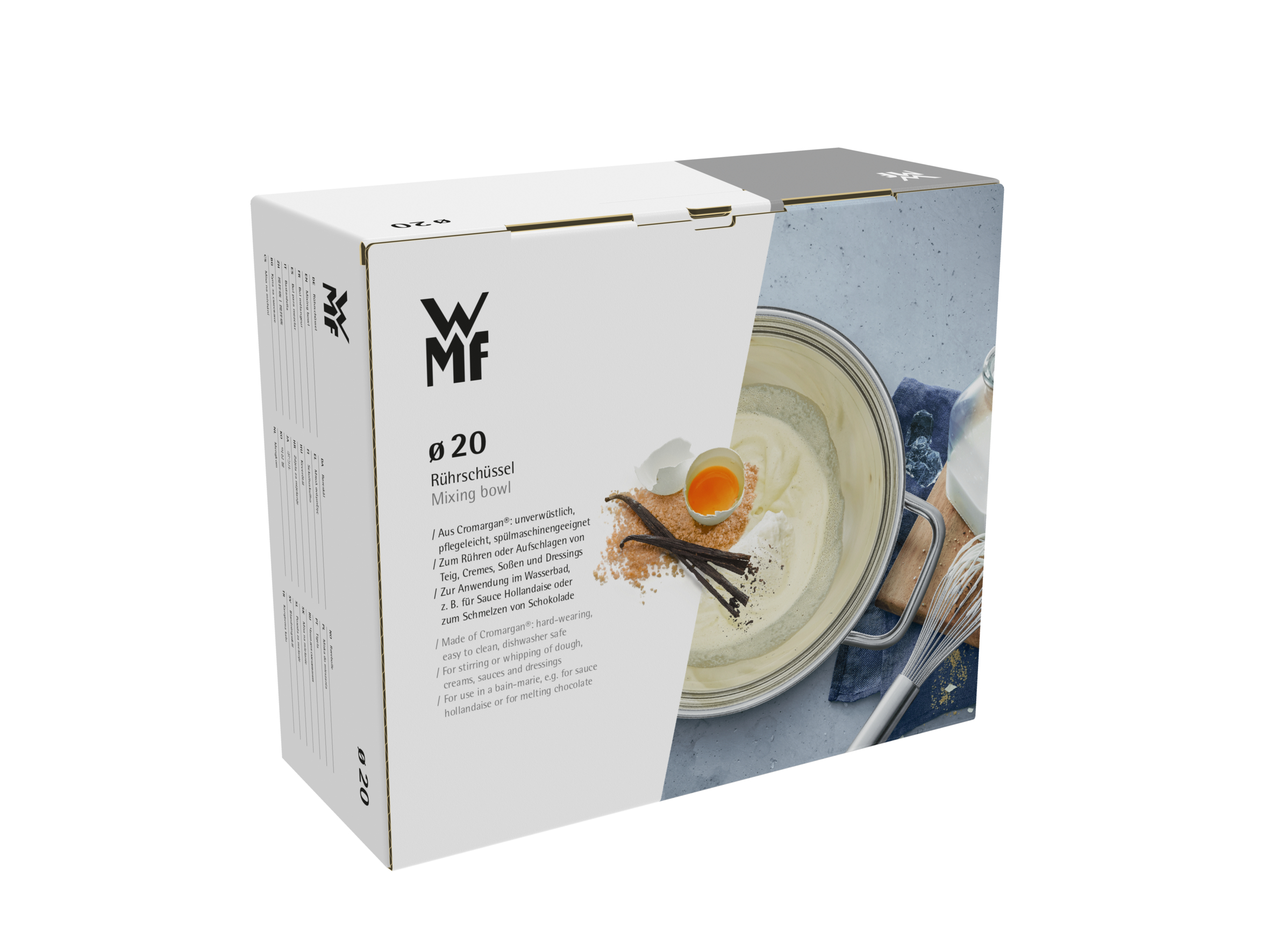 Rührschüssel mit Zutaten in einer Box, mit Schneebesen und anderen Gegenständen.