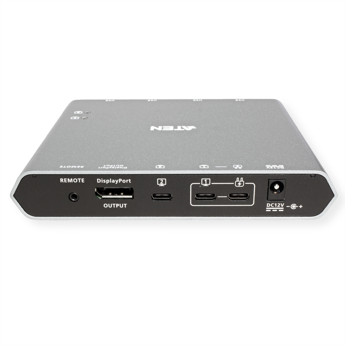 Appareil rectangulaire argenté avec plusieurs ports, dont une sortie DisplayPort et des ports USB.