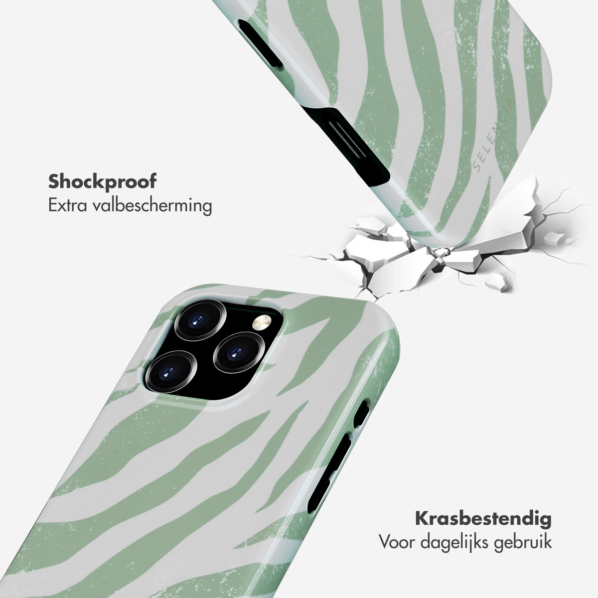 Een telefoonhoesje wordt laten vallen en scheurt een oppervlak. Tekst: Schokbestendig & krasbestendig.