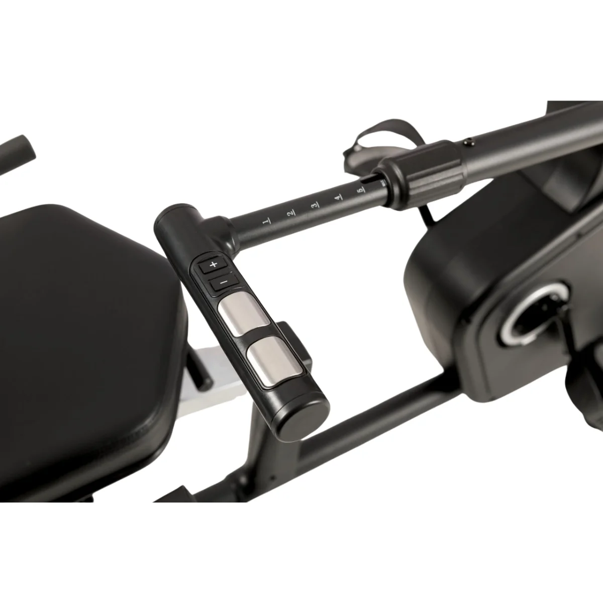 Close-up of exercise equipment handle. Black and silver color scheme. Numbers and buttons.