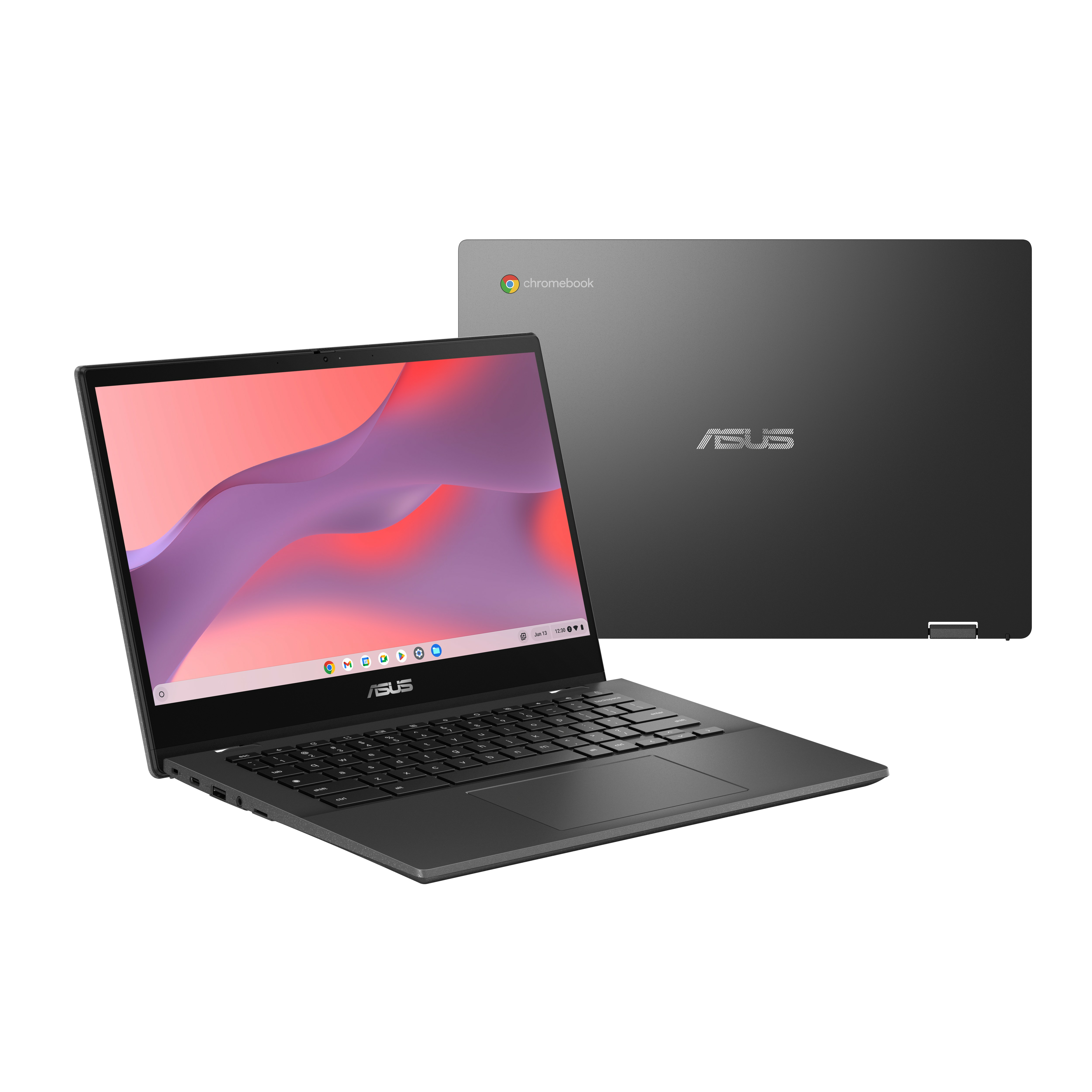 Laptop nero e grigio aperto. Secondo laptop dietro, chiuso.