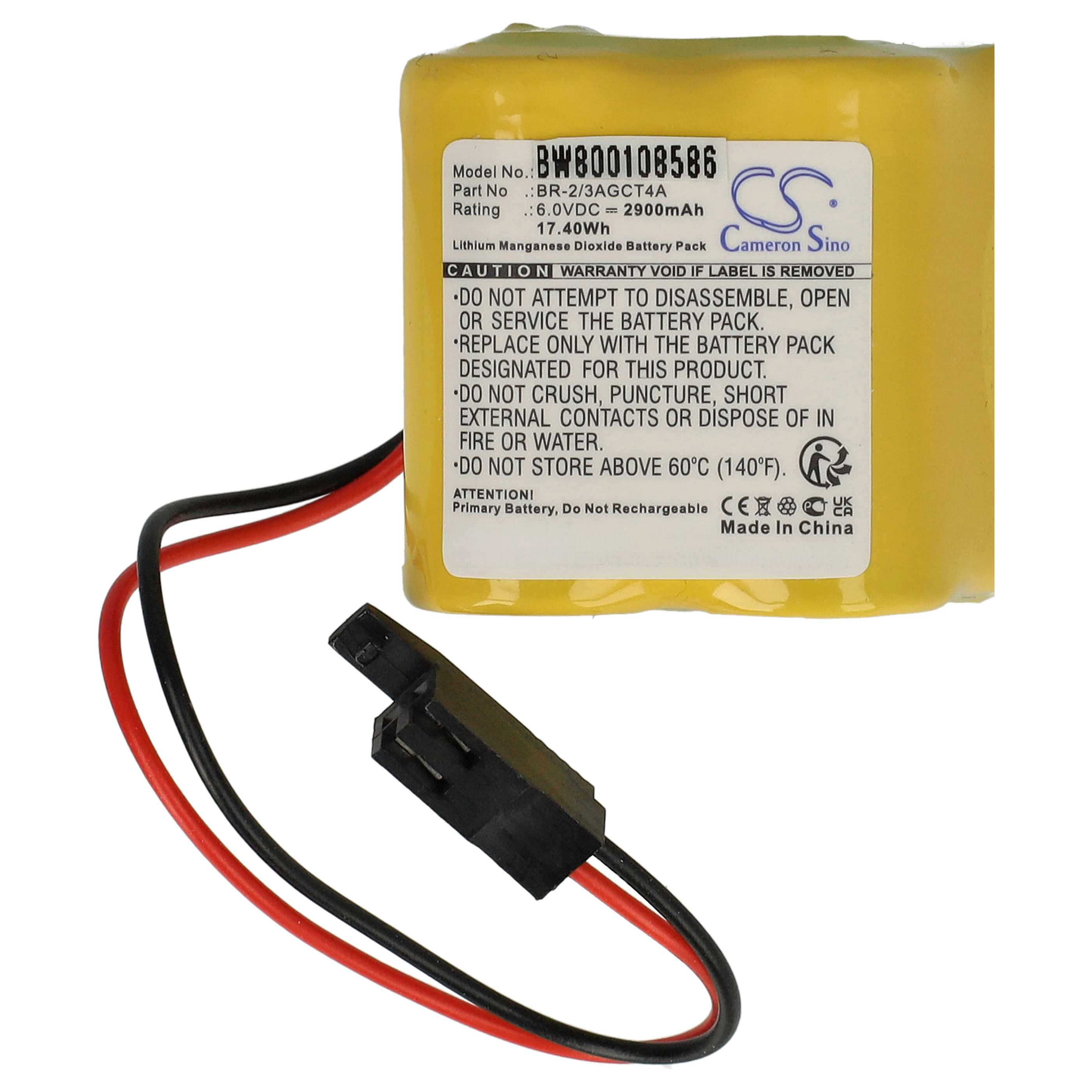 Gelber Akku mit schwarzen und roten Drähten und einem schwarzen Stecker. Textetikett sichtbar.