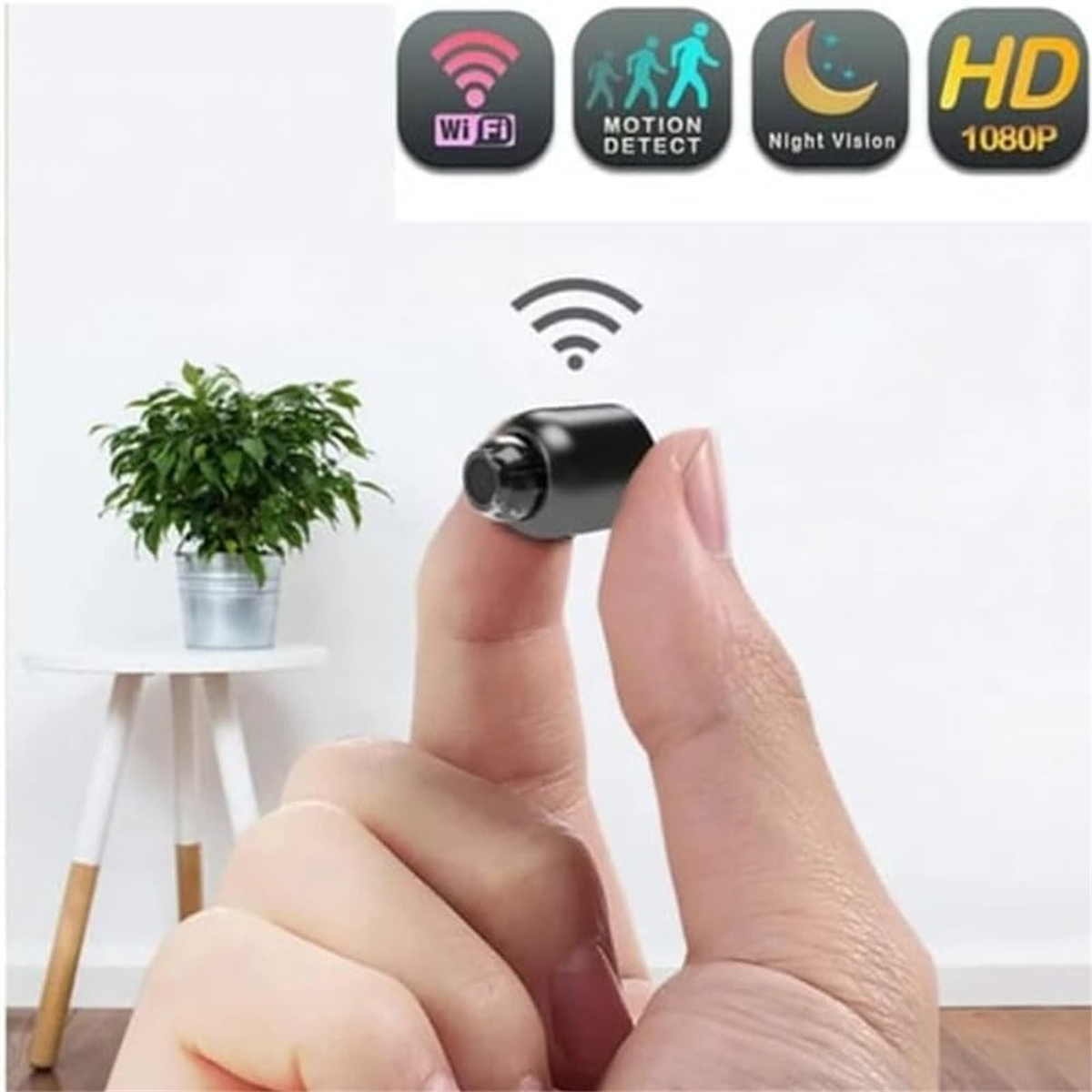 Kleine schwarze Spionagekamera in einer Hand, mit Symbolen darüber.