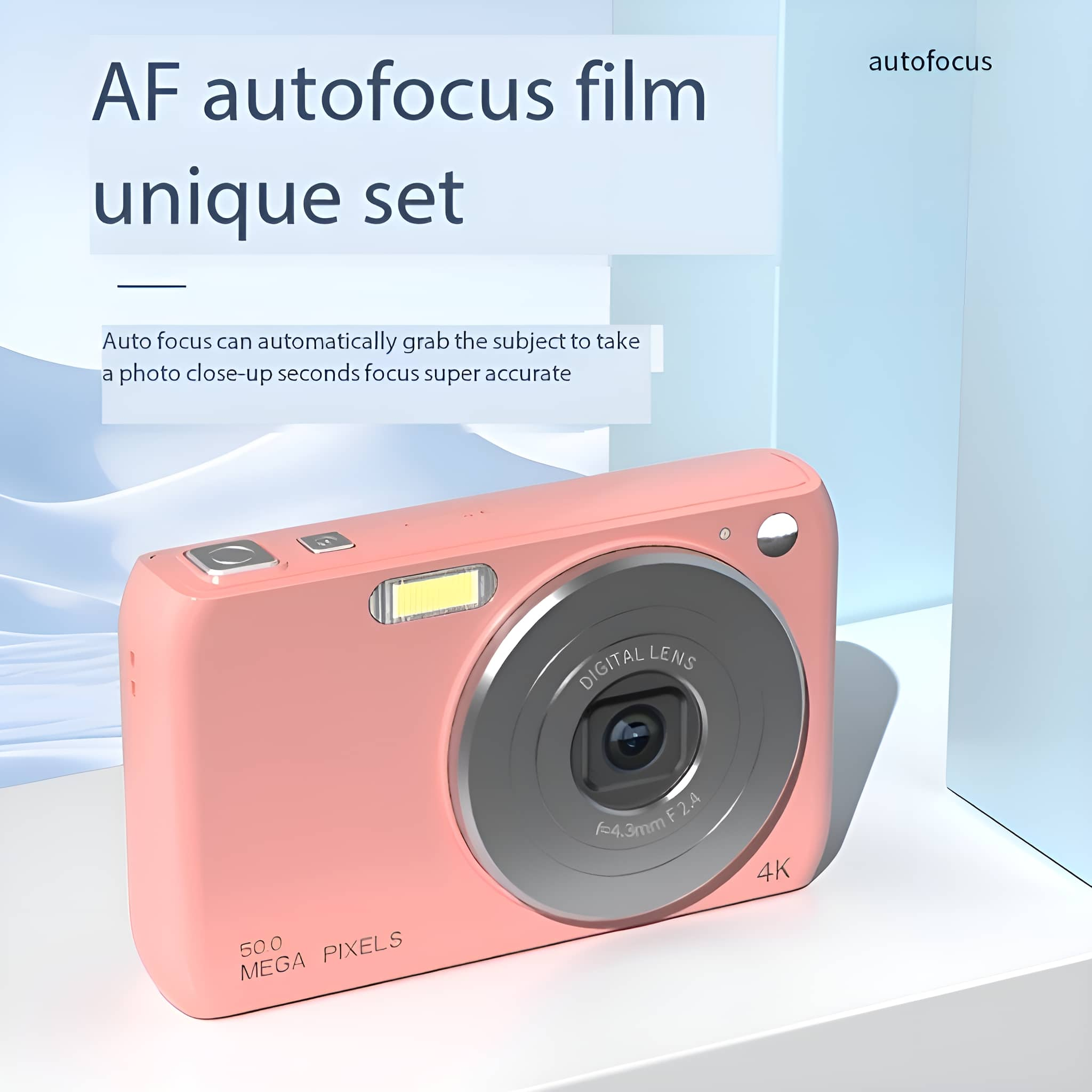 Eine pinke Digitalkamera mit Objektiv und Blitz, Text: 'AF Autofokus Film einzigartiges Set'.