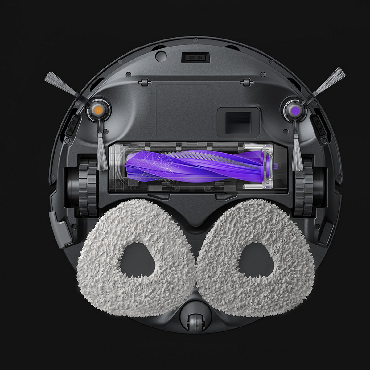 Vista inferiore di un aspirapolvere robot, che mostra spazzole e componenti di pulizia.