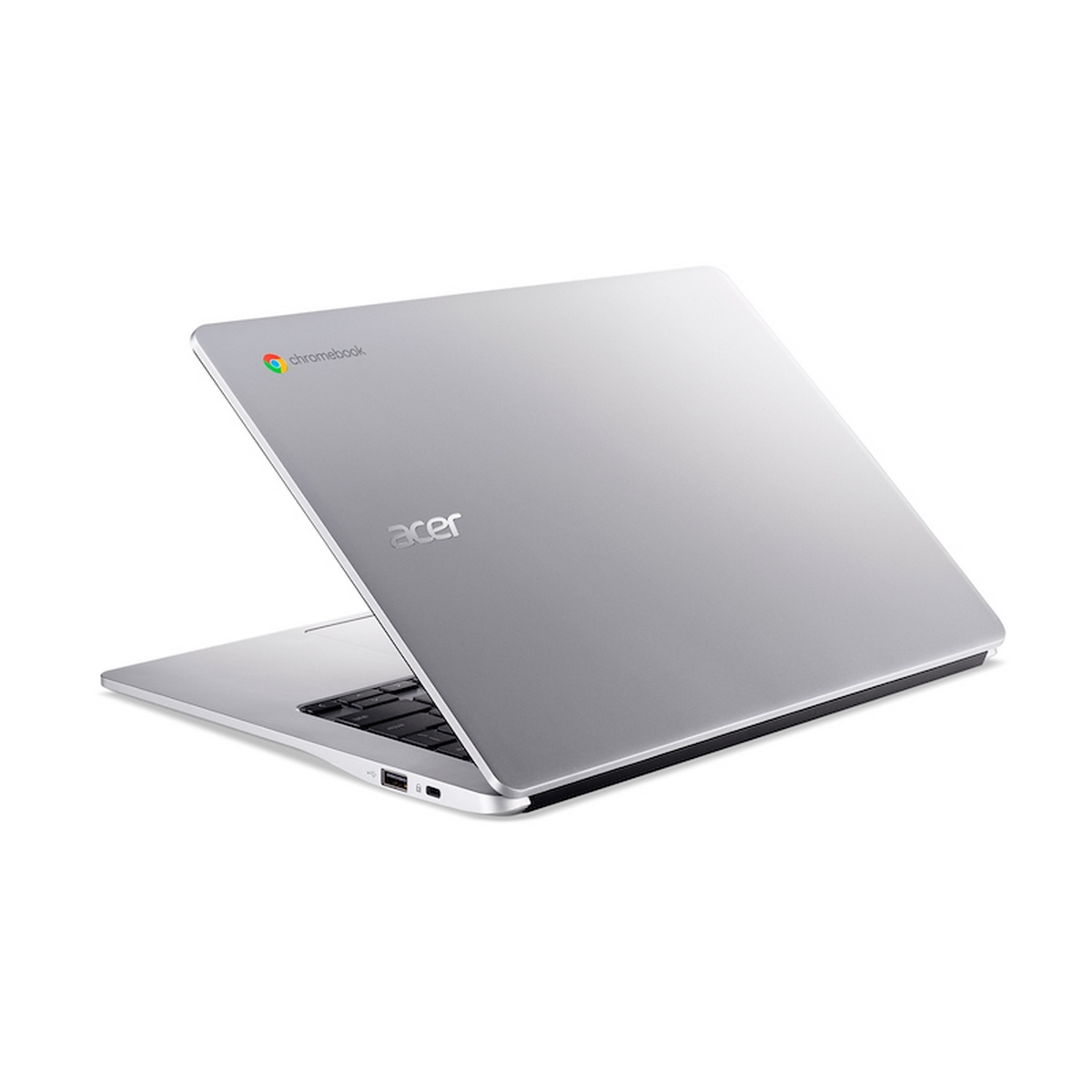 Un laptop Acer Chromebook argentato aperto su sfondo bianco, tastiera visibile.