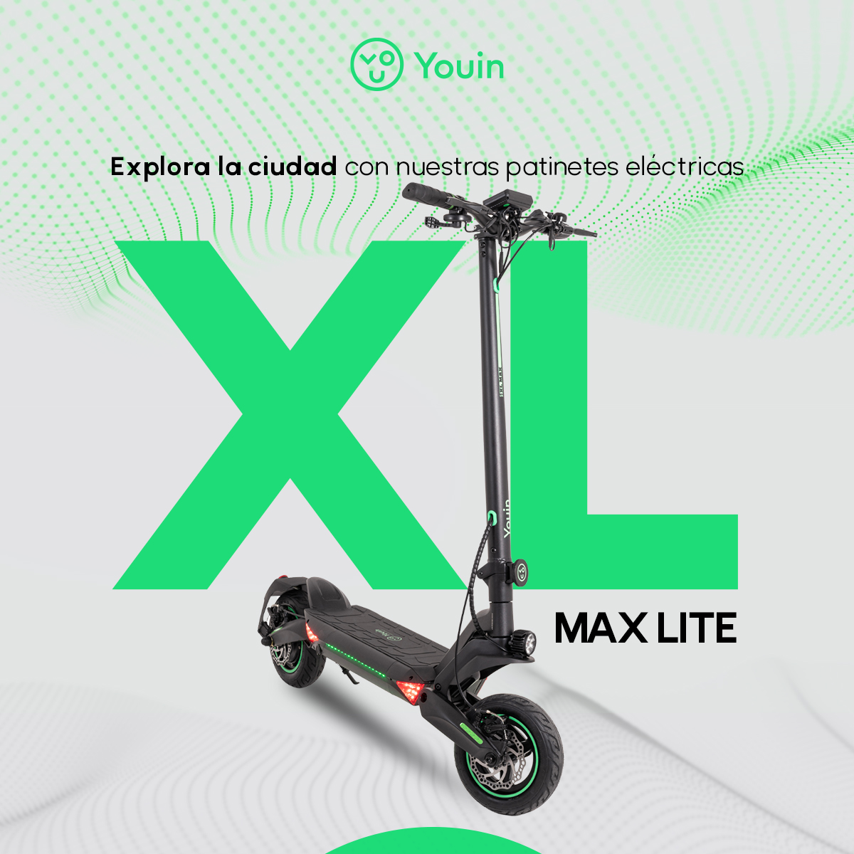 Un patinete eléctrico negro y verde con las palabras XL MAX LITE. Fondo verde.