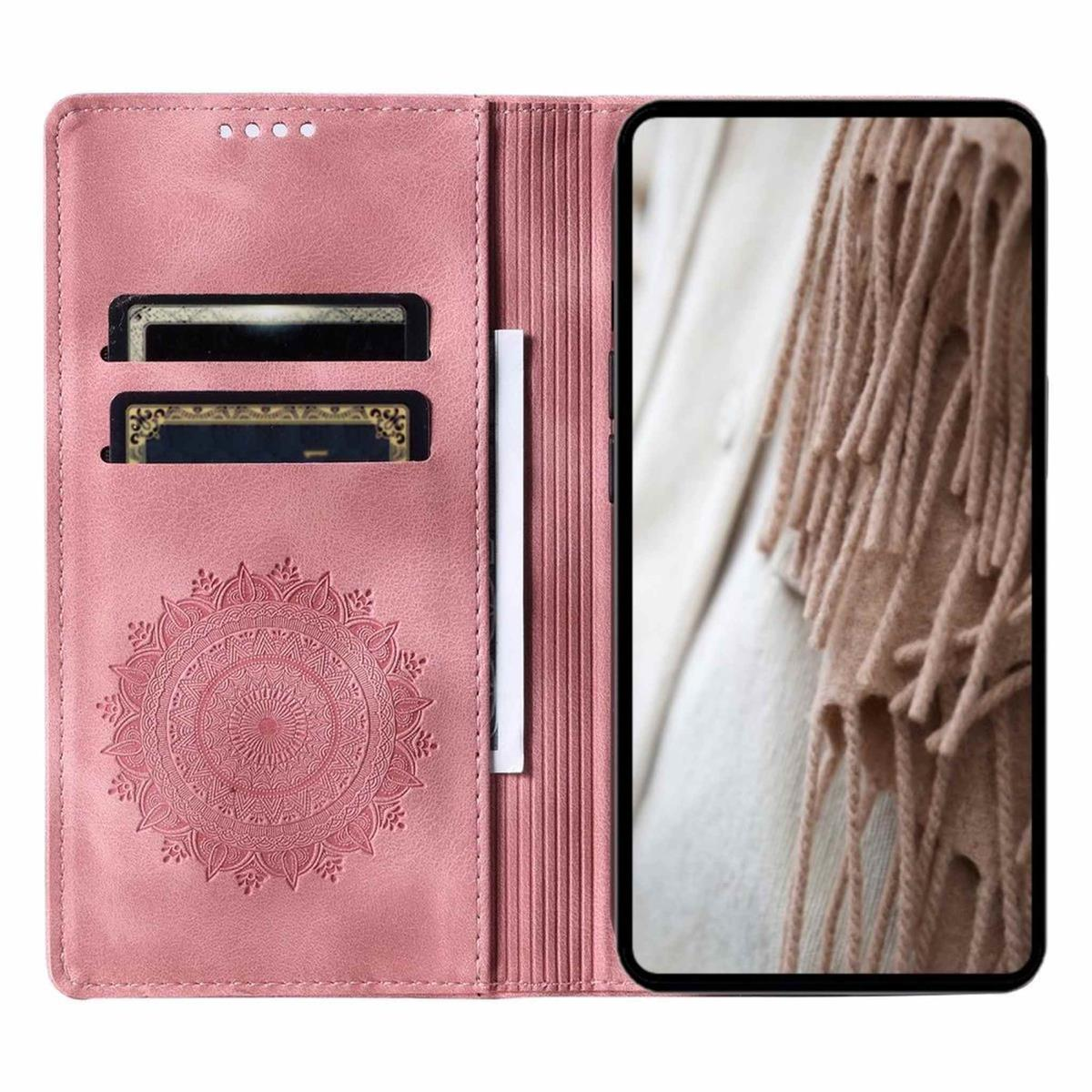 Eine rosa Brieftaschen-Handyhülle mit Kartenfächern und einem Mandala-Muster.