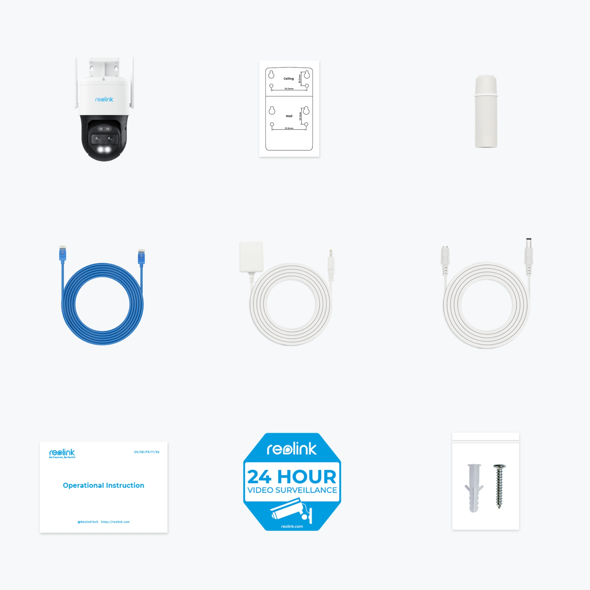 Kamera bezpieczeństwa i akcesoria, w tym kabel, instrukcje i znak.