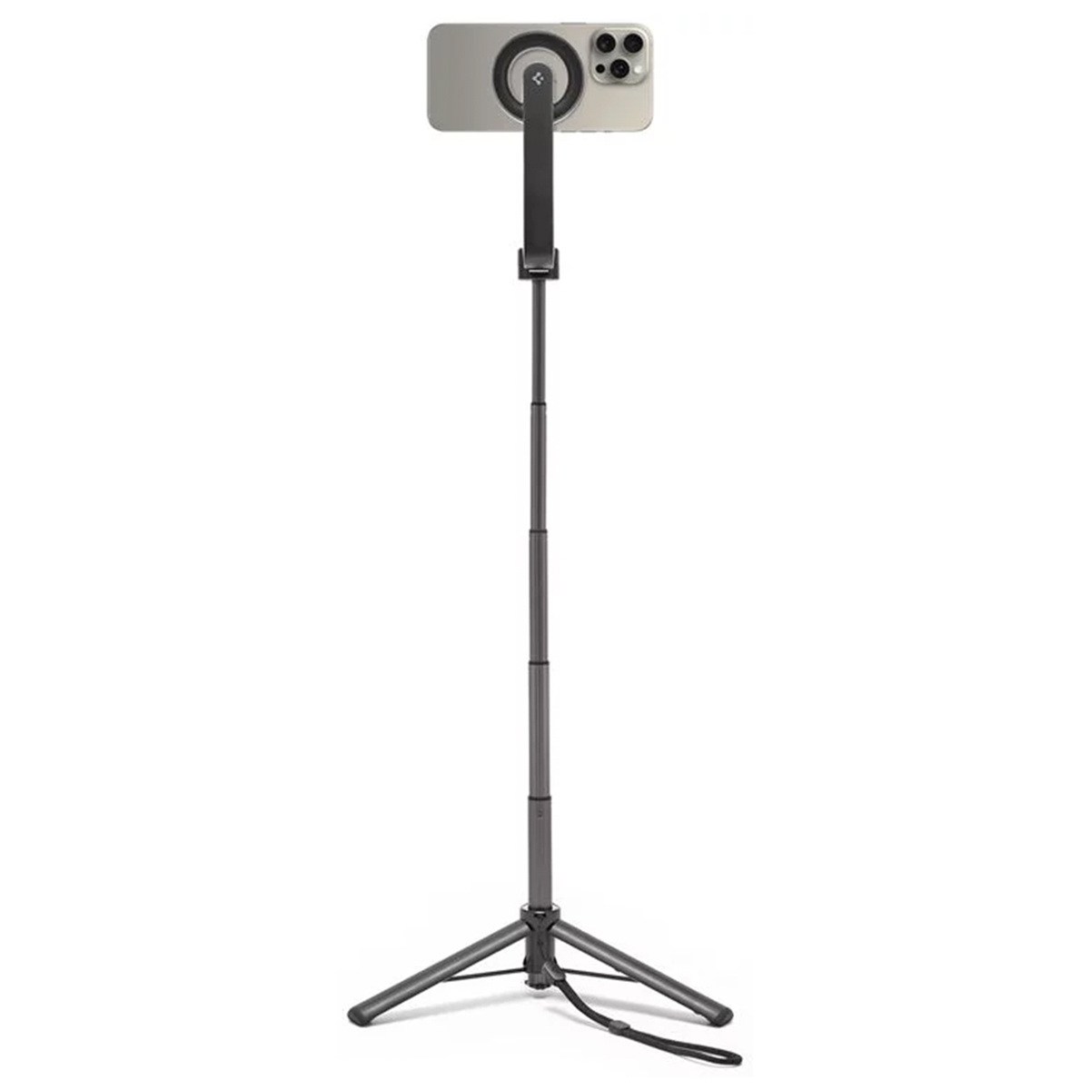 Un telefono montato su un treppiede per selfie grigio, su sfondo bianco.