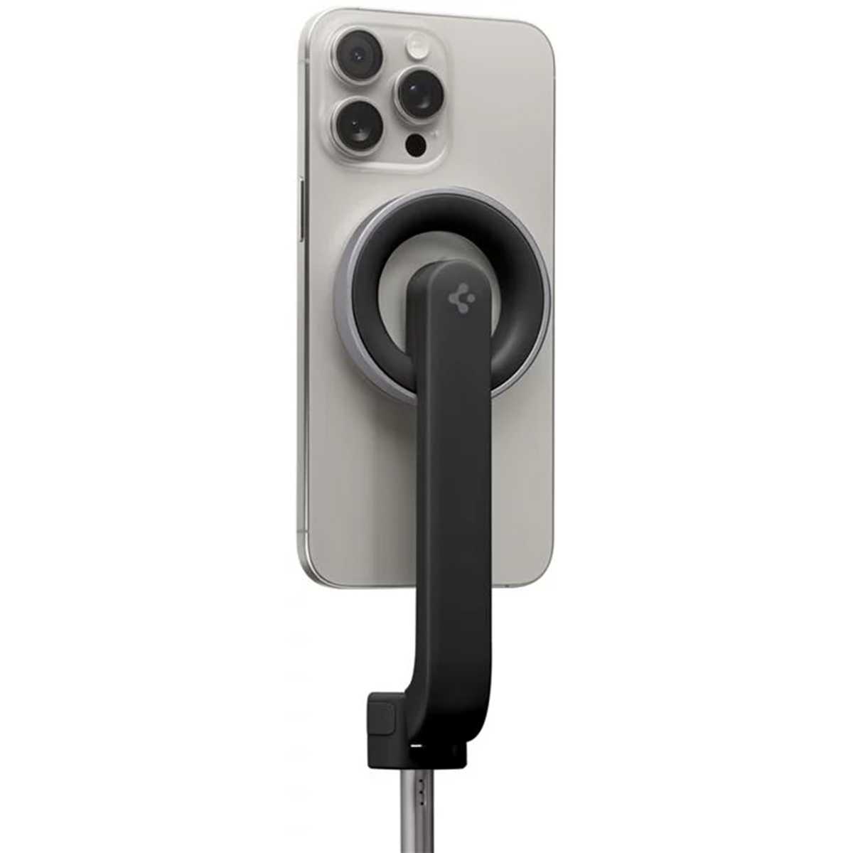 Uno smartphone è collegato a un supporto magnetico. Il telefono ha una fotocamera e un supporto nero.
