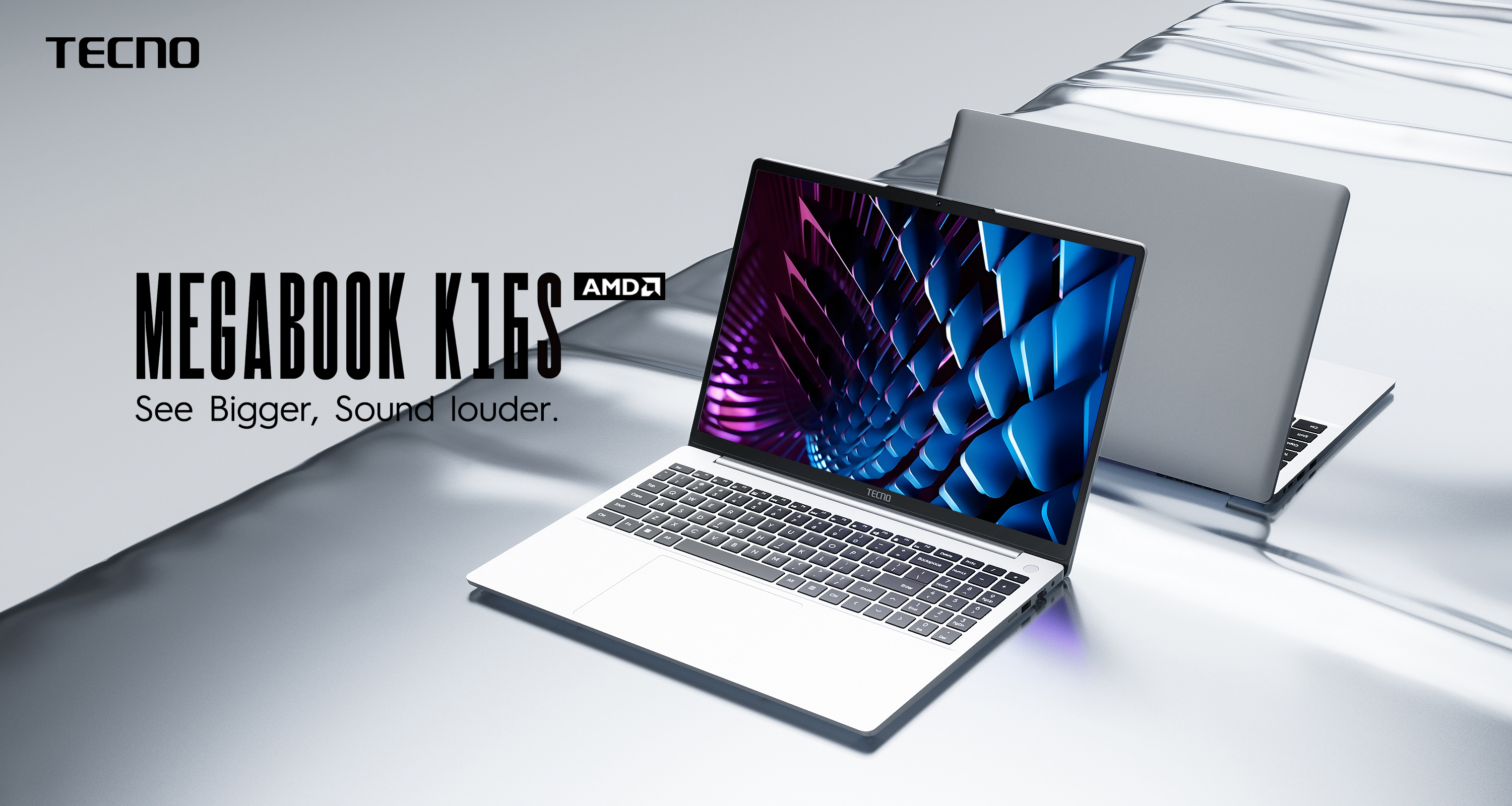Una computadora portátil con cuerpo blanco, abierta, mostrando una pantalla colorida.