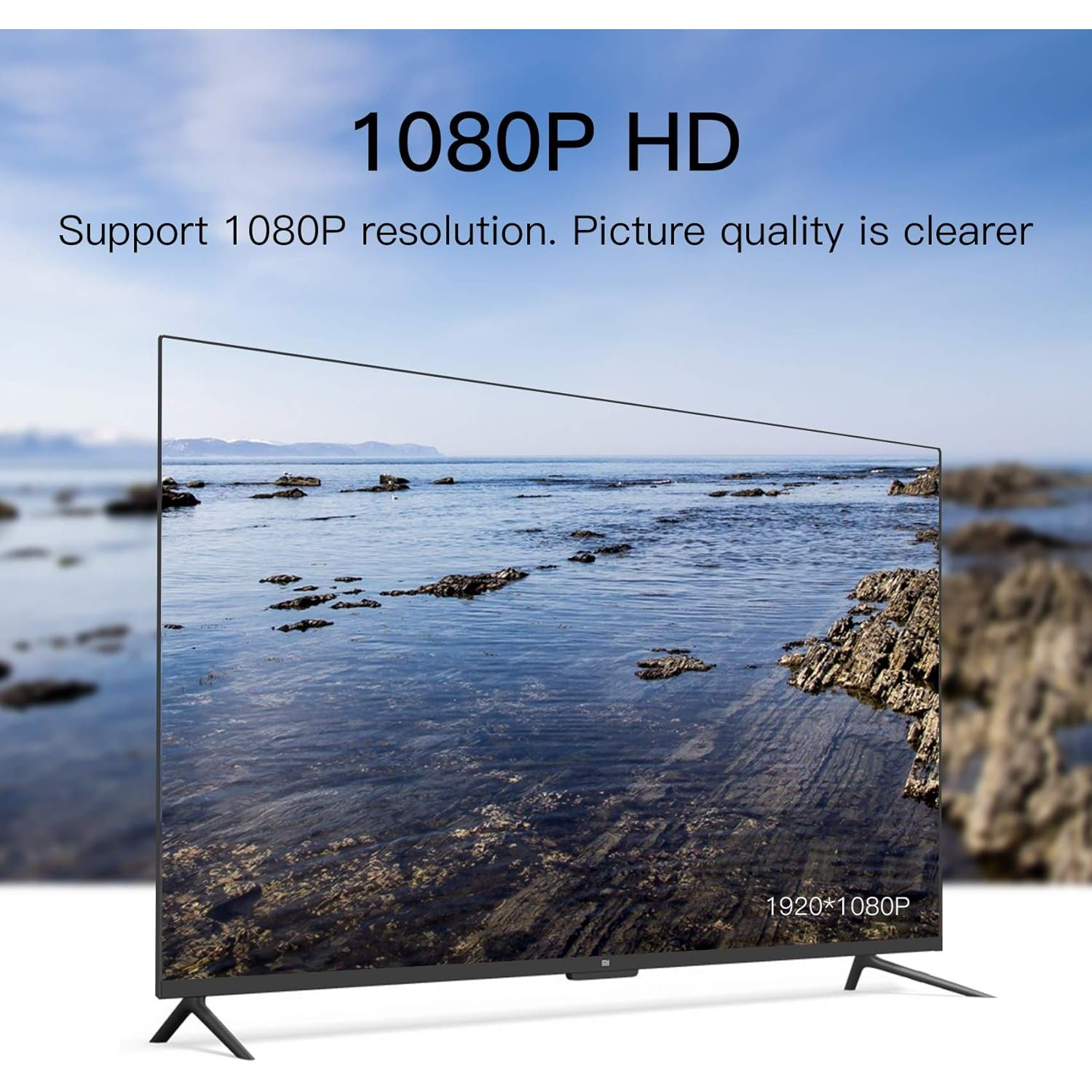 Un televisor moderno que muestra una vista escénica del océano, con superposición de texto.