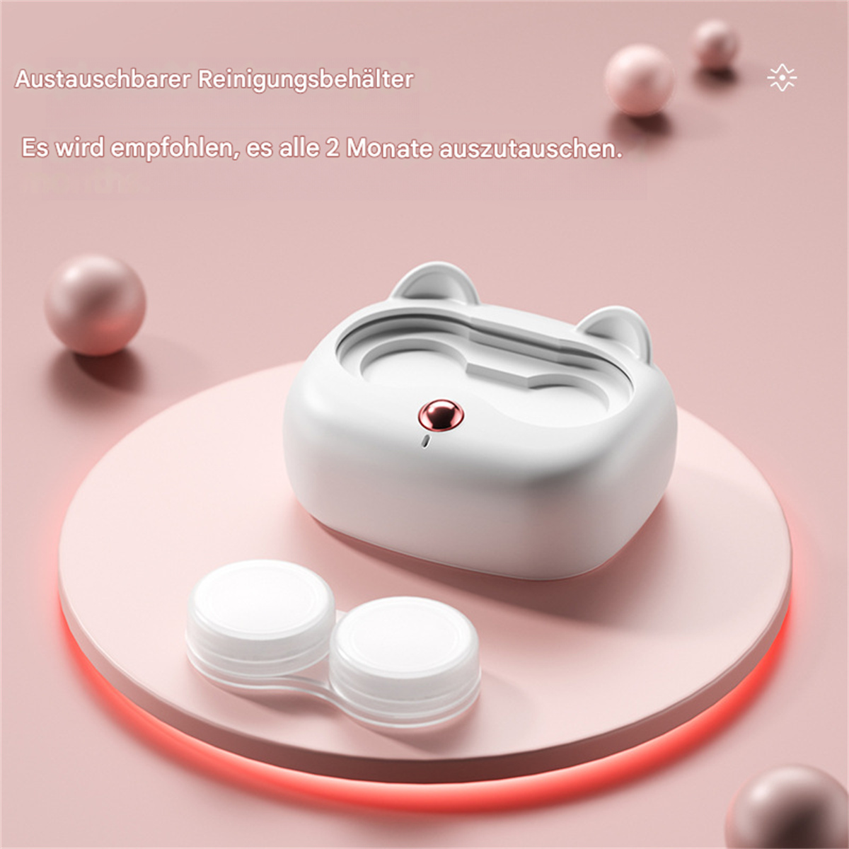 Ein weißer Kontaktlinsenreiniger mit einem Behälter für Linsen und einem rosa Hintergrund.