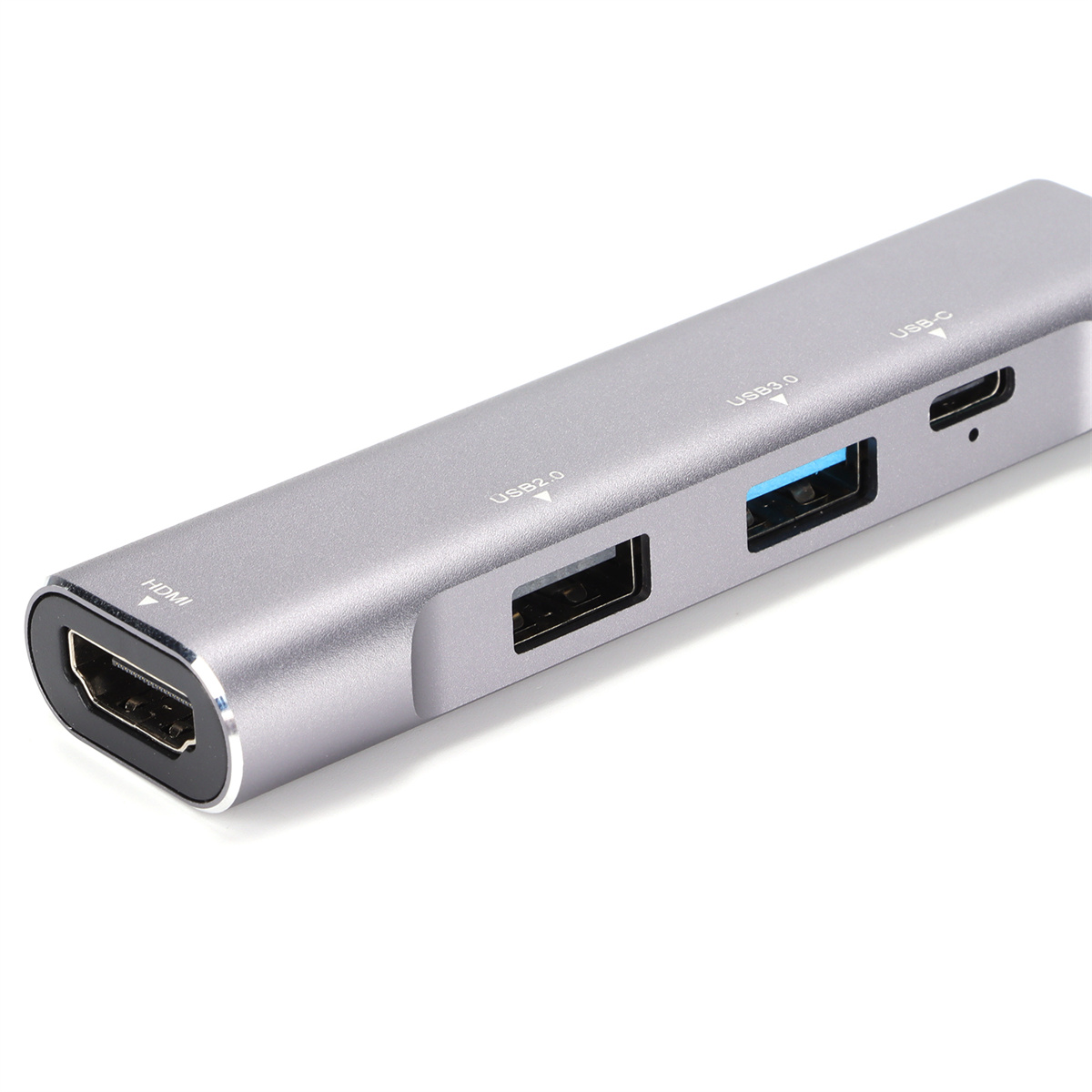 Silberner USB-Hub mit verschiedenen Anschlüssen. HDMI, USB 2.0, USB 3.0 und USB-C-Anschlüsse sind sichtbar.