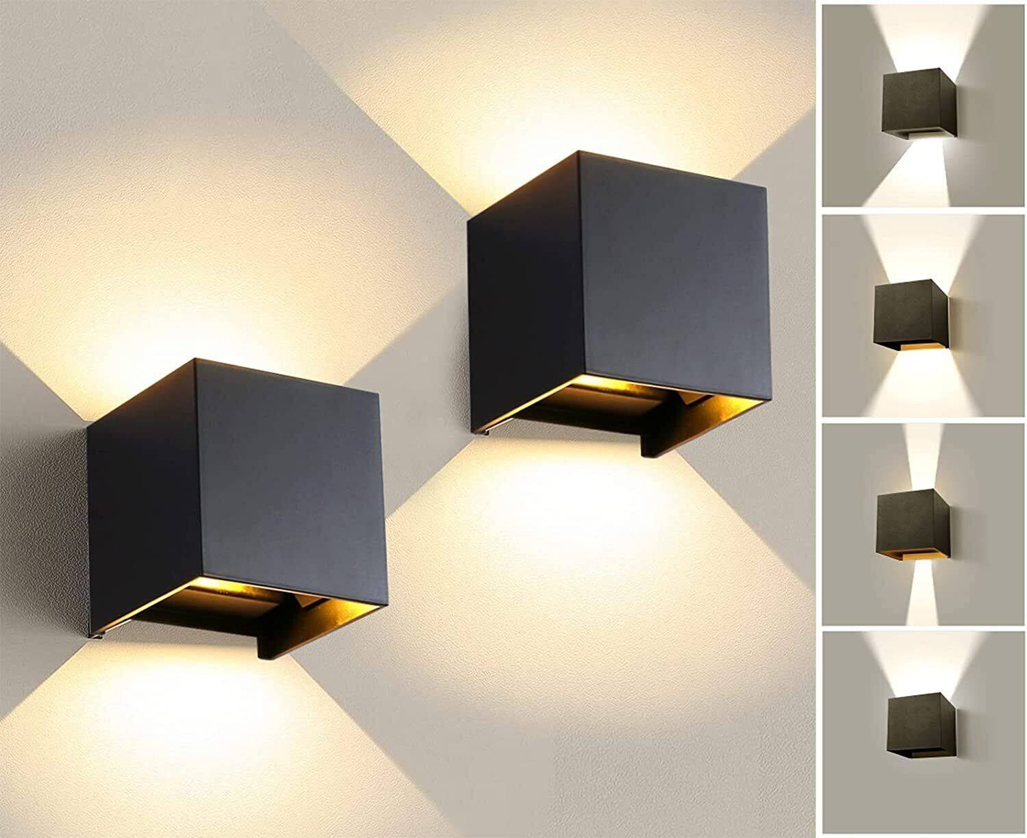 Quadratische schwarze Wandleuchten. Sechs Lichtmuster. Goldfarbene Innenseite.