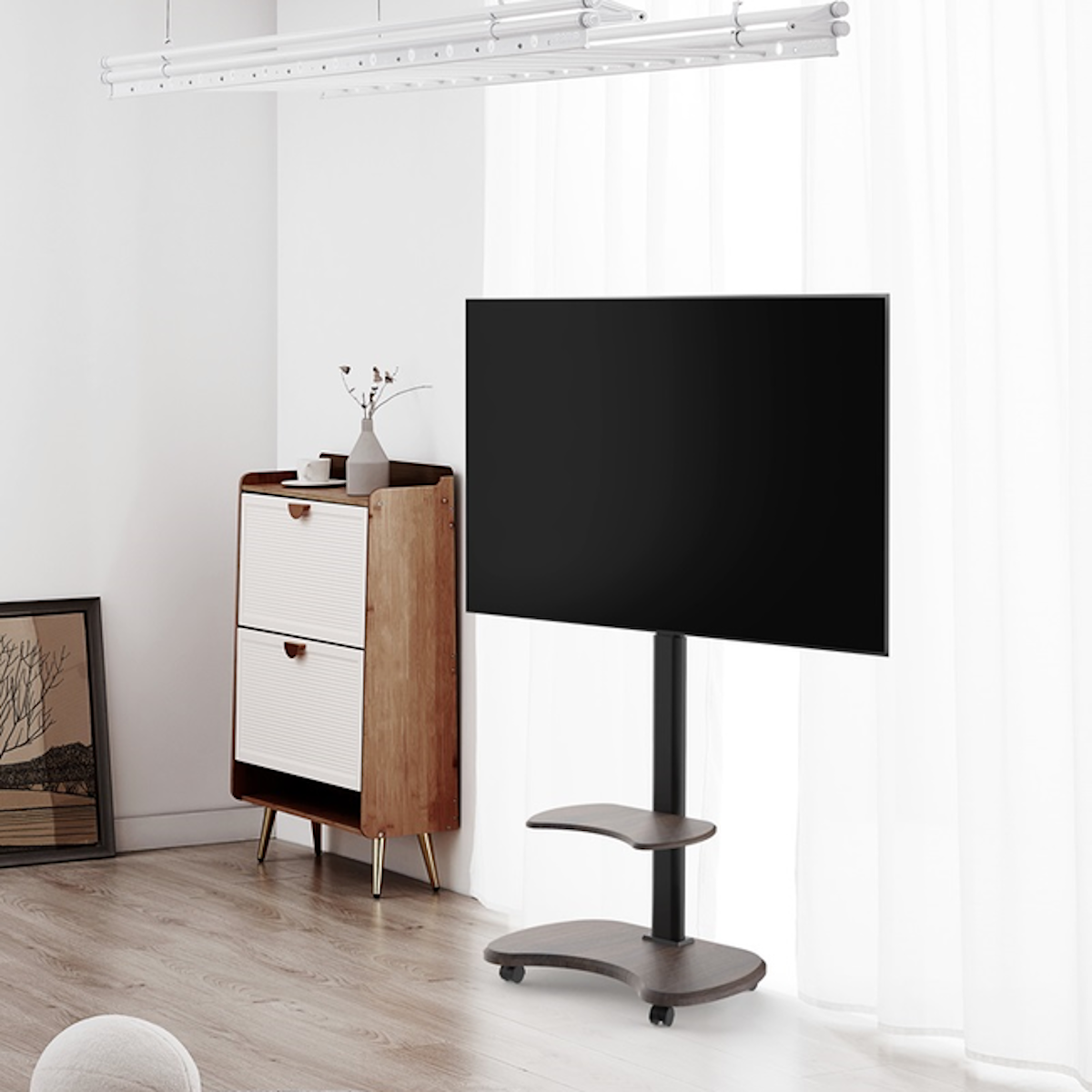 A grey, adjustable TV wall mount, top view, extended to the side.
