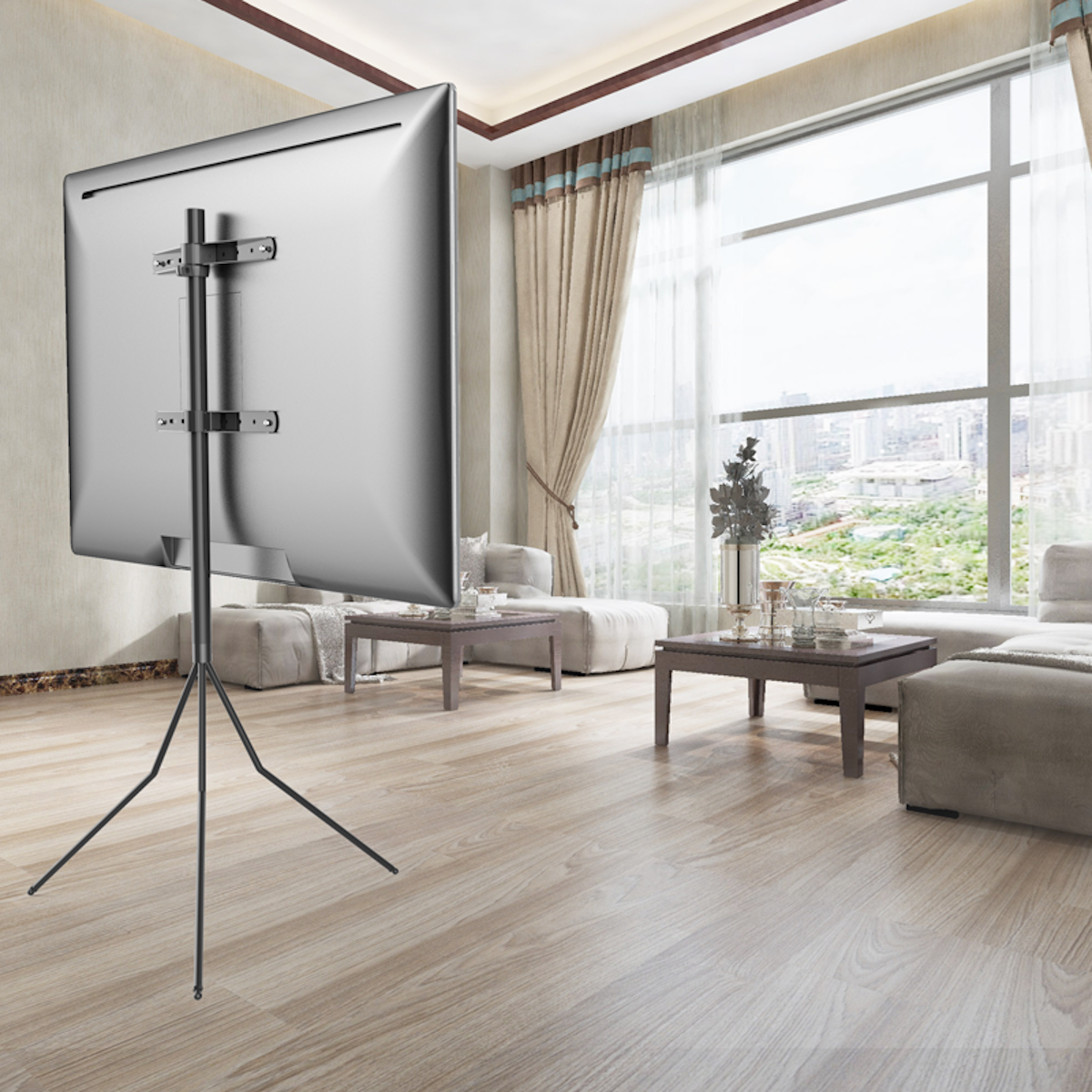 A living room with a TV mounted on a tripod stand. The TV is angled away.