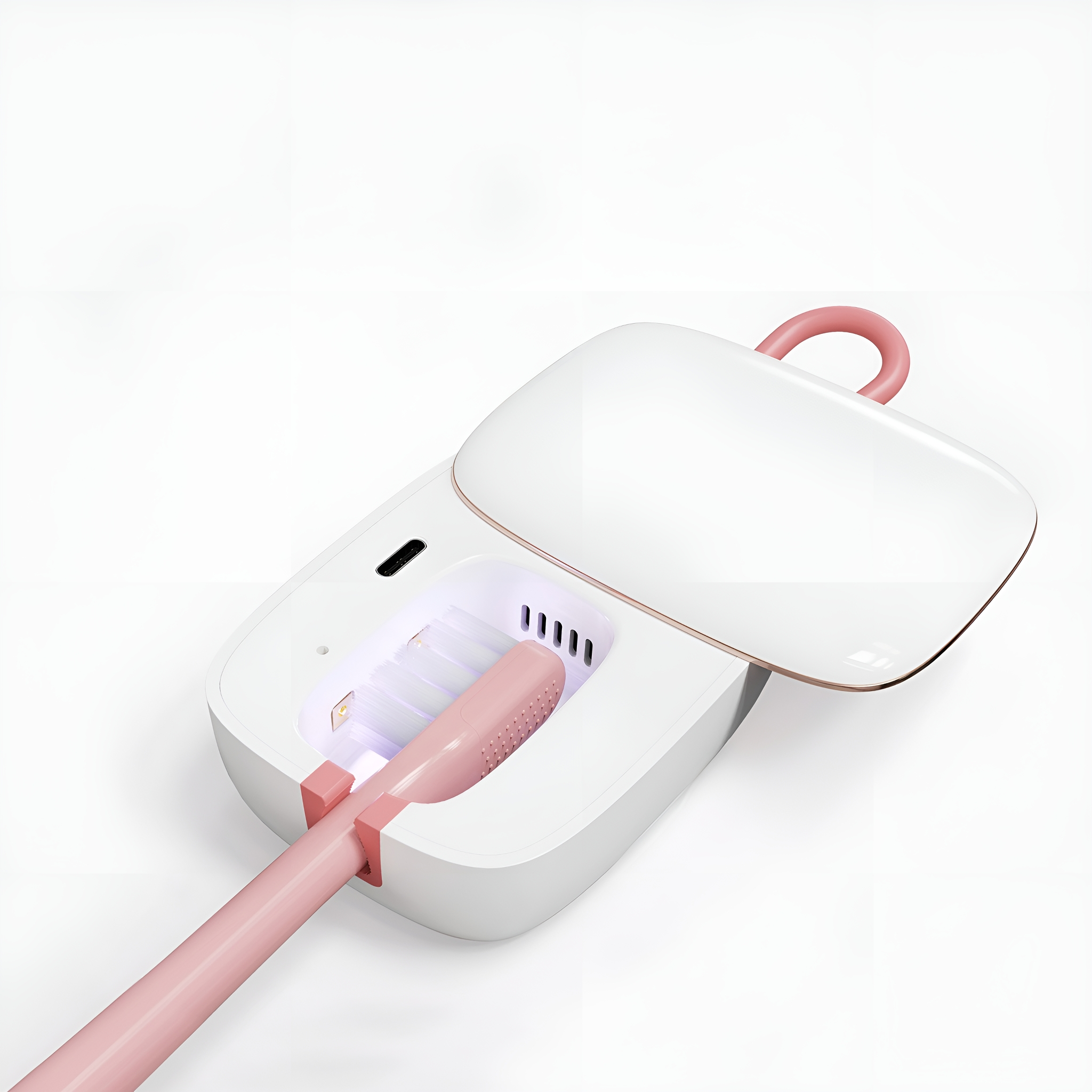 Weißer und rosa Zahnbürstensterilisator. Geöffnet, mit rosa Griff und UV-Licht.