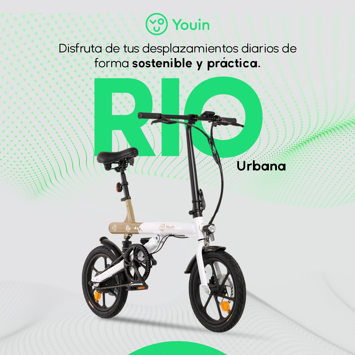 Czarno-biały rower elektryczny na zielonym tle.