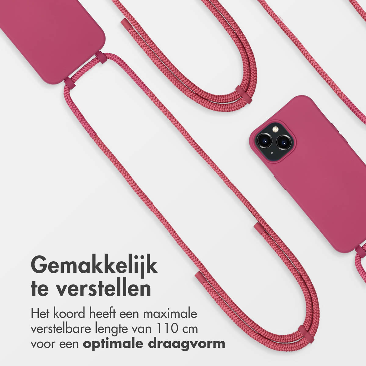 Eine rosa Handyhülle mit einer pinkfarbenen Schnur. Die Schnur ist gewebt und an der Hülle befestigt.
