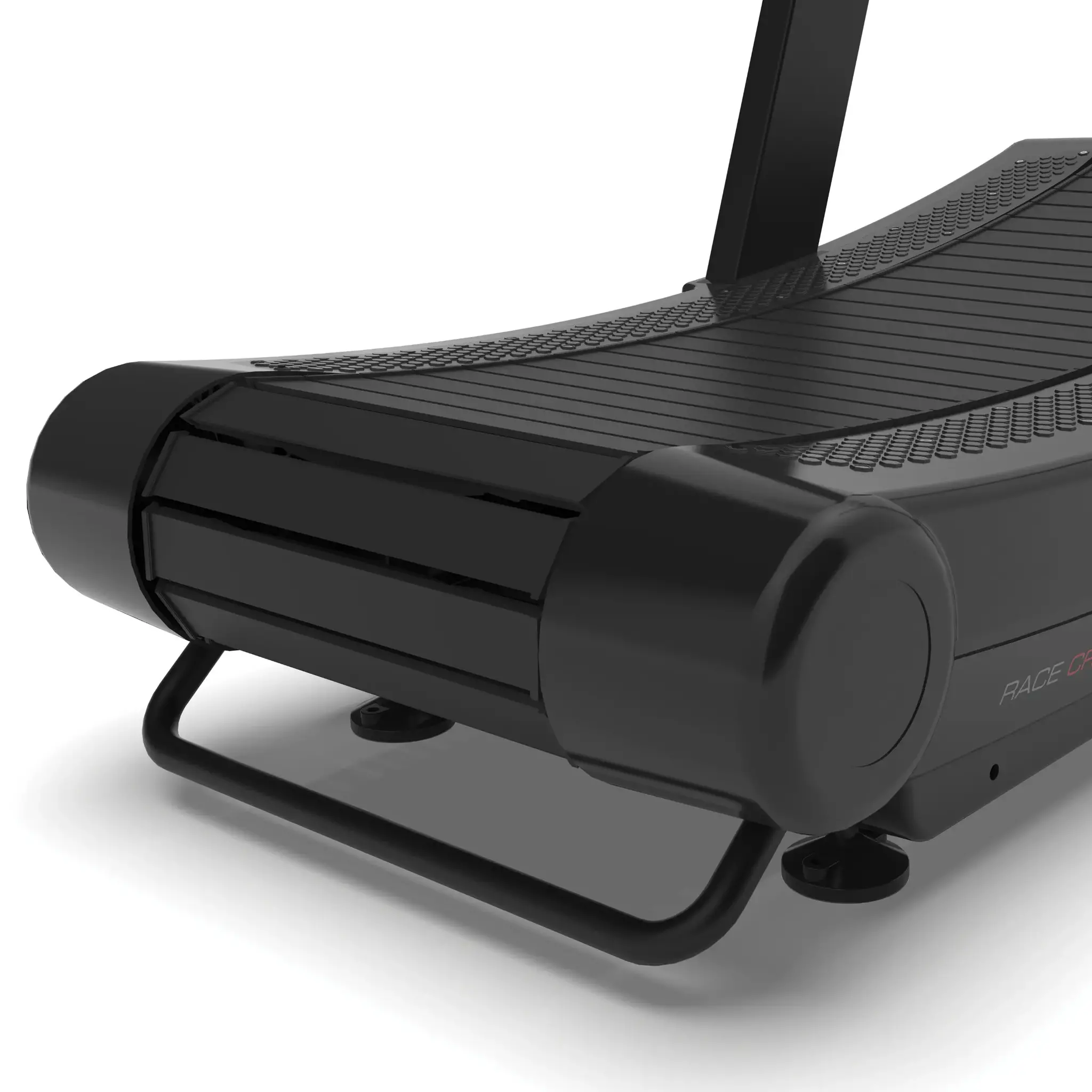Close-up of a black treadmill. The view highlights the front roller and the foot support.