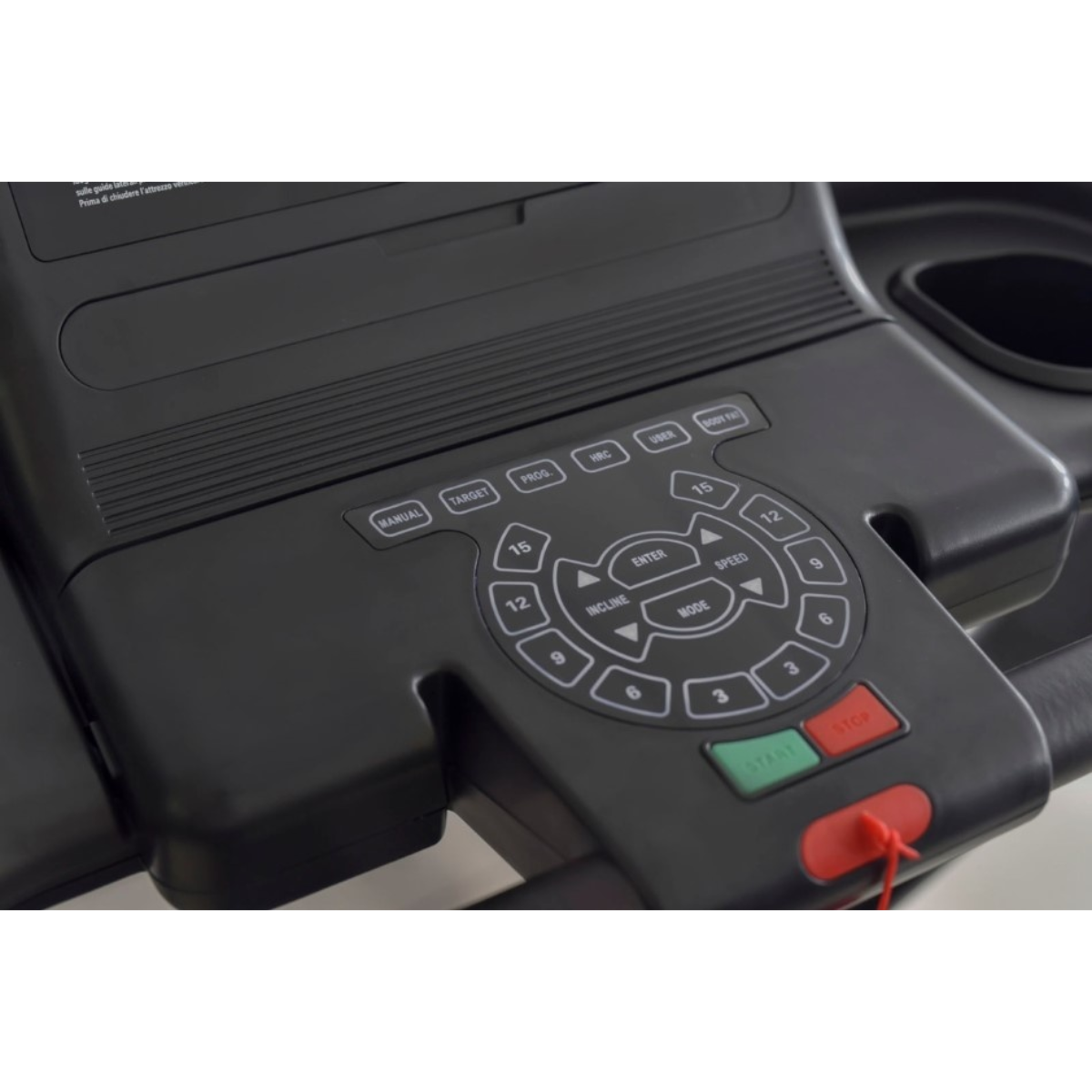 Close-up of a black treadmill control panel with buttons and a start/stop button. Red safety key.