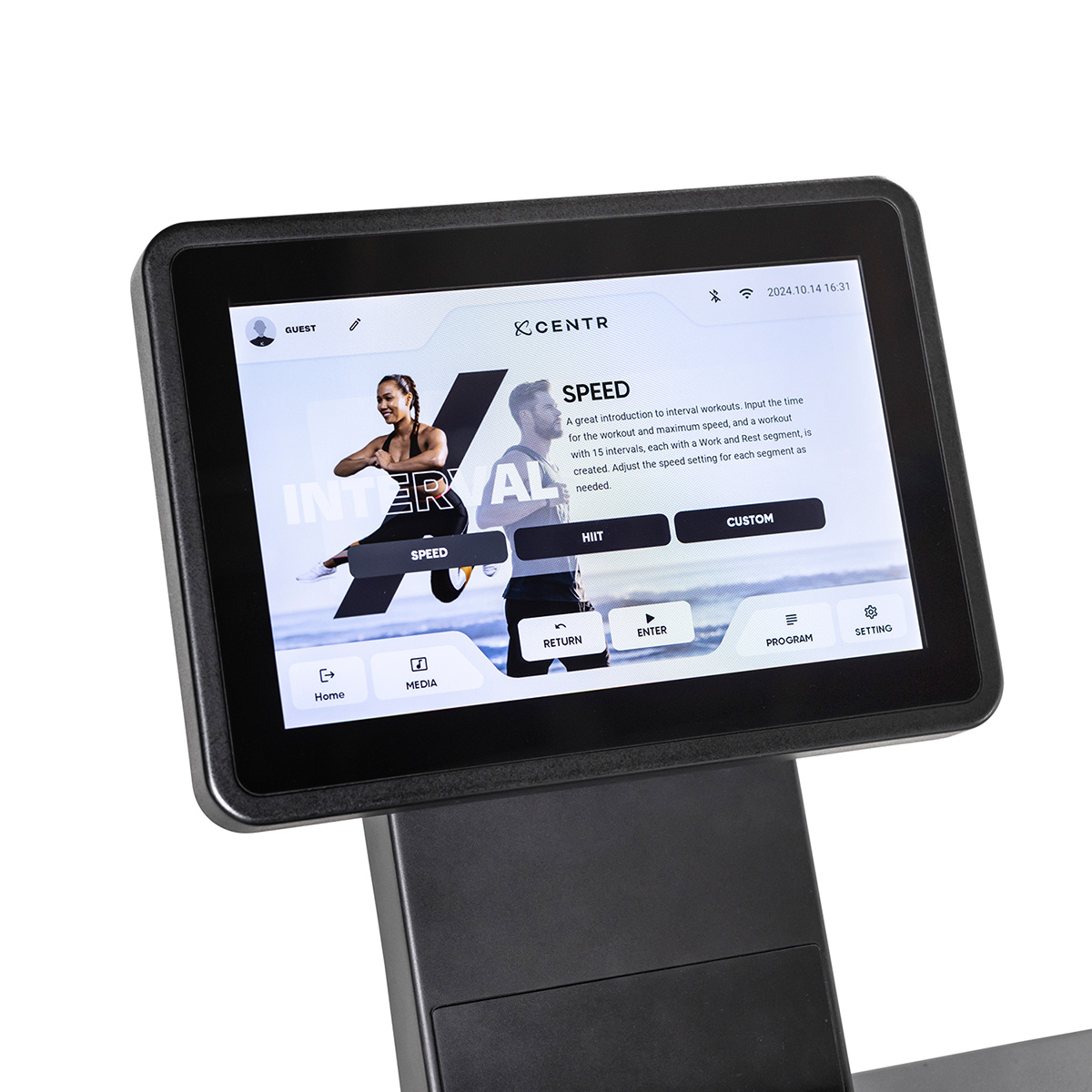 Close-up of treadmill screen displaying an exercise program with a woman running and text.