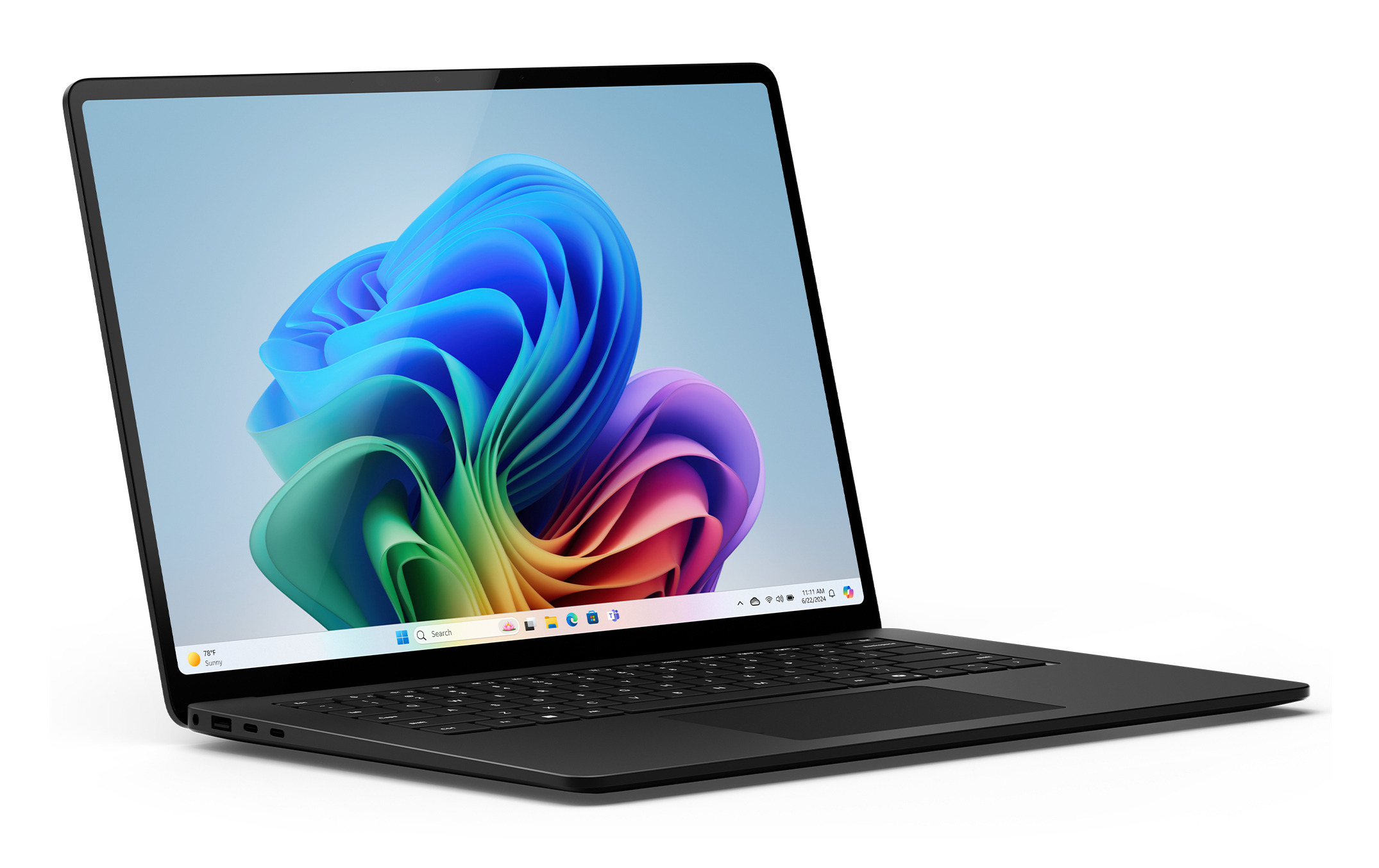 Czarny laptop z interfejsem Windows 11, otwarty na biurku. Kolorowa, abstrakcyjna tapeta.